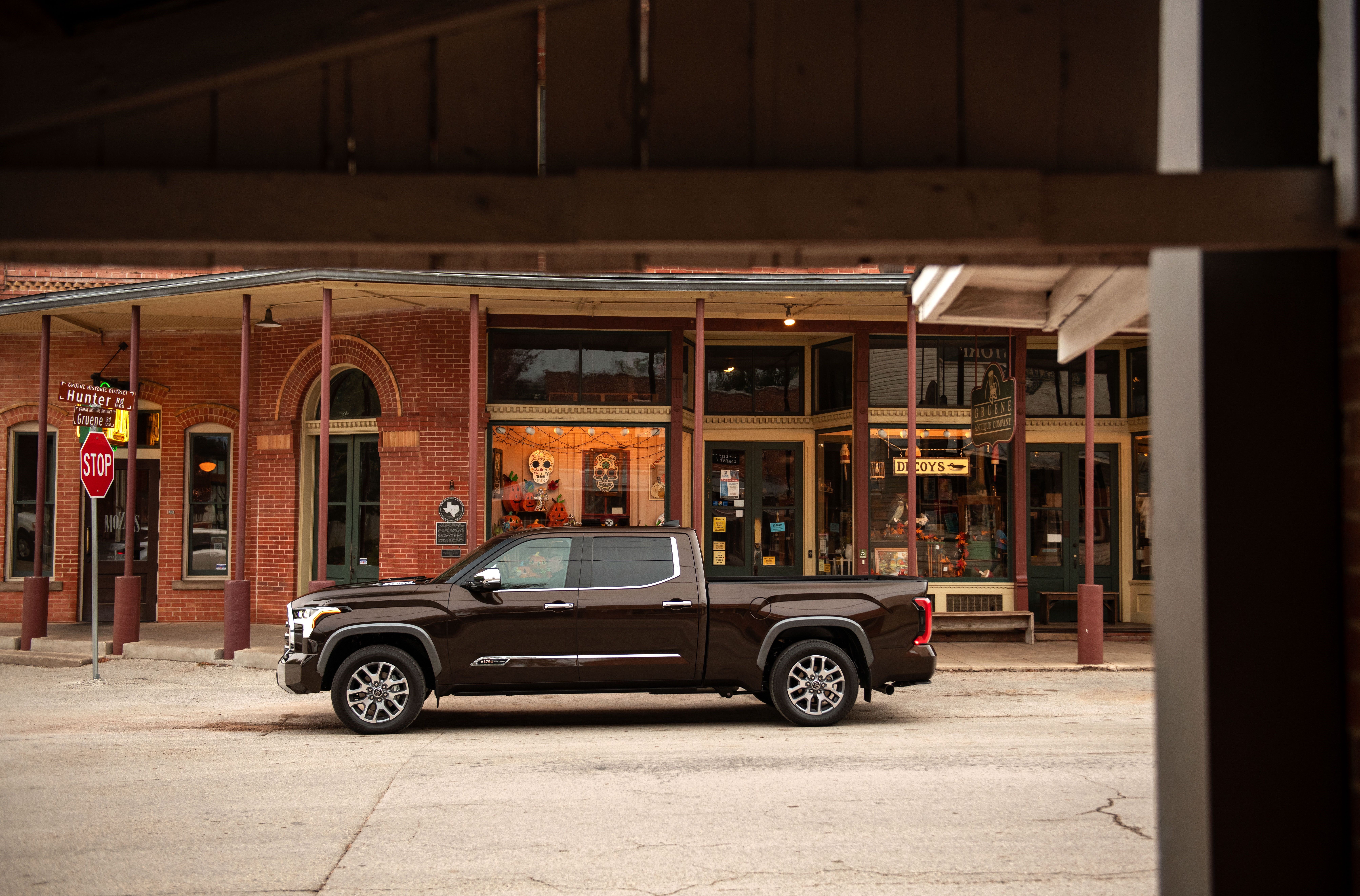 Brown Toyota Tundra CrewMax 1794 Edition parked HD Wallpaper