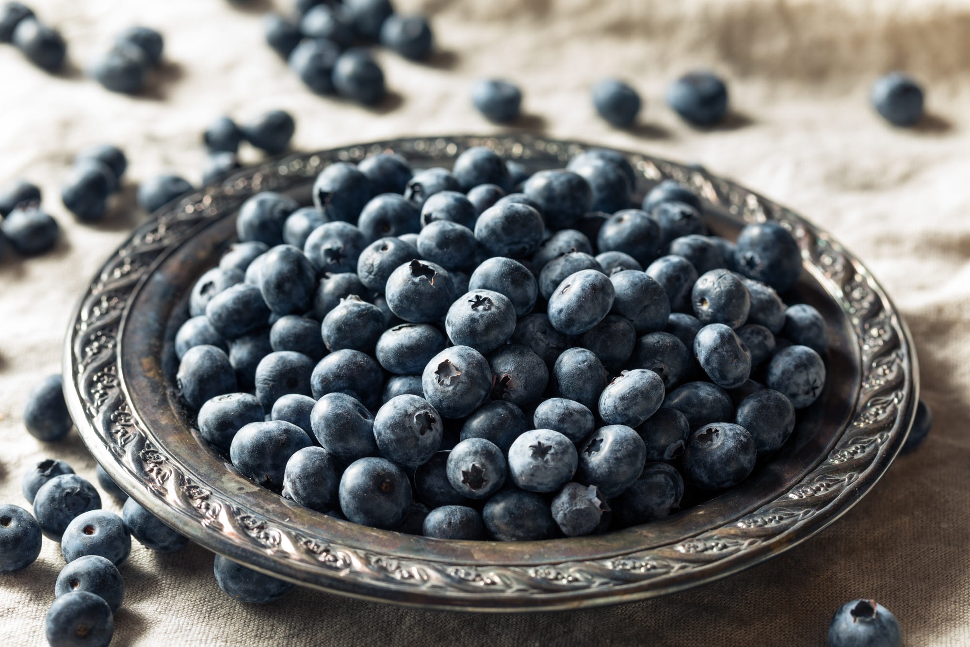 Blueberries in a decorative metal bowl HD Wallpaper