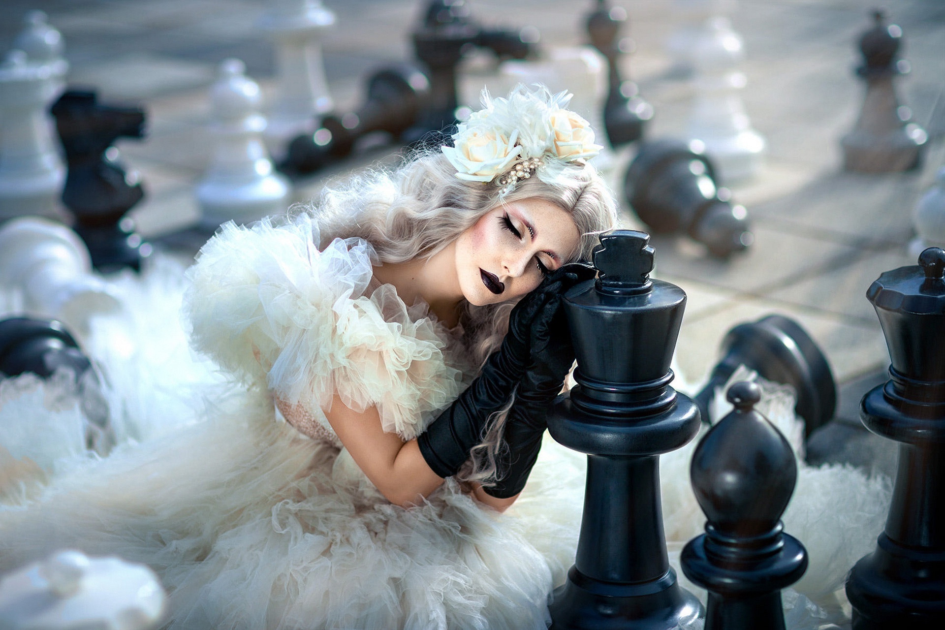 Woman in white dress sleeping on chess king HD Wallpaper