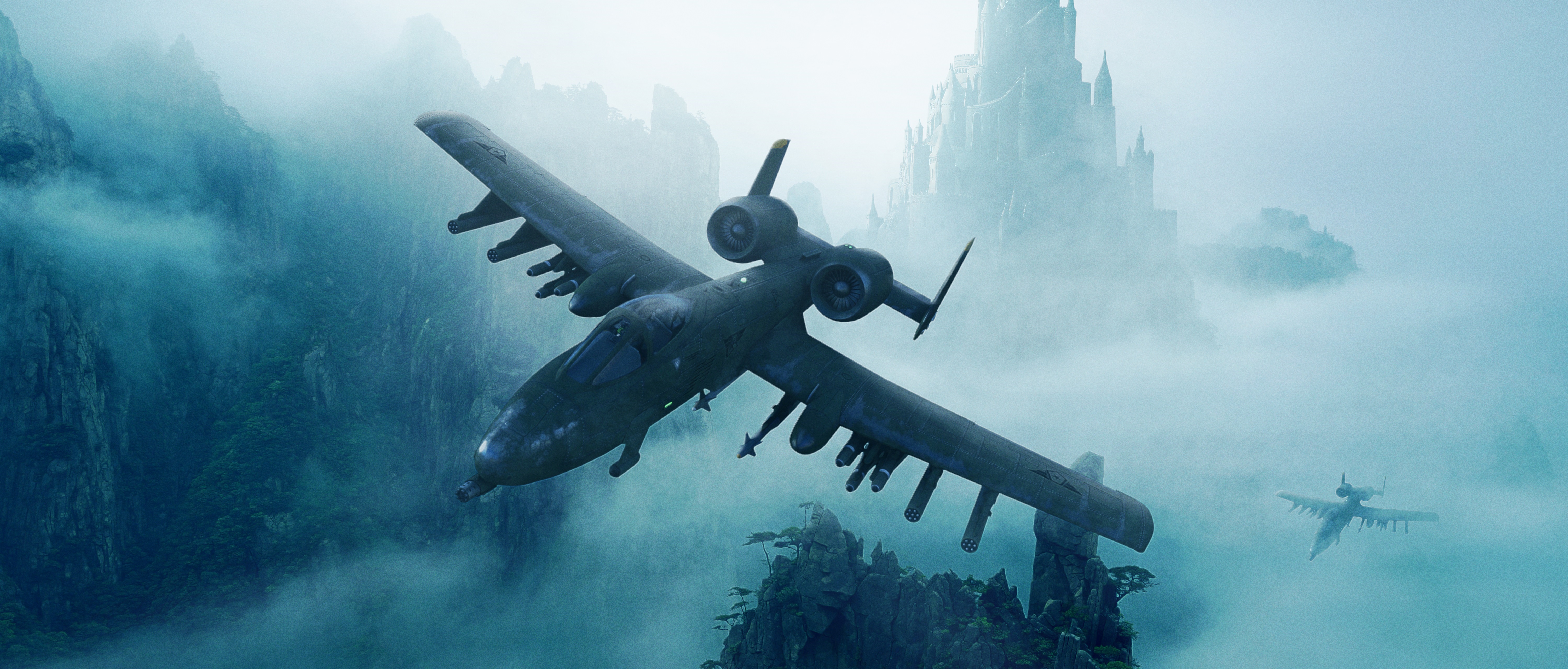 A-10 Thunderbolt II aircraft flying over misty mountains HD Wallpaper