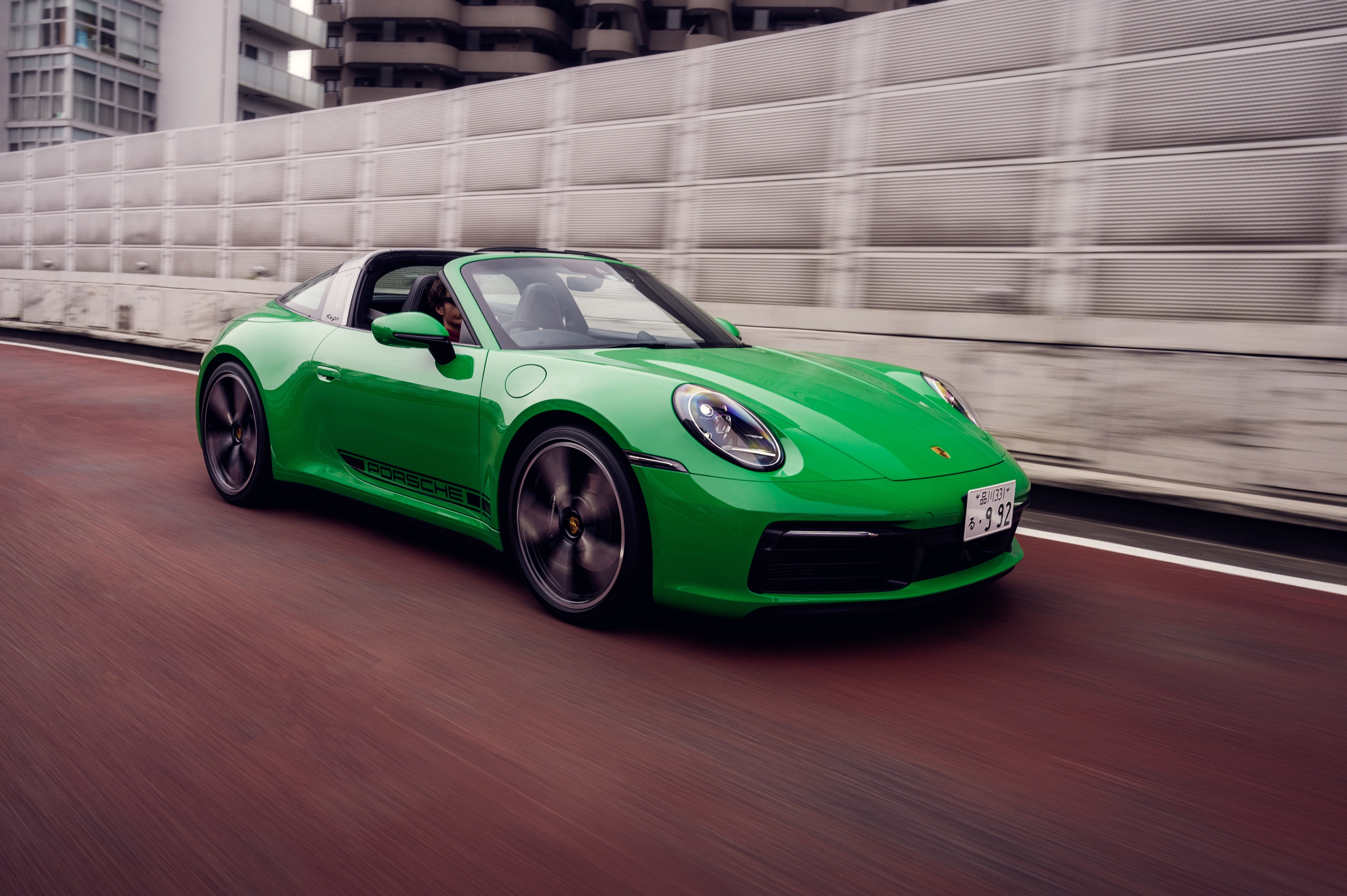 Green Porsche 911 Targa driving on a road HD Wallpaper