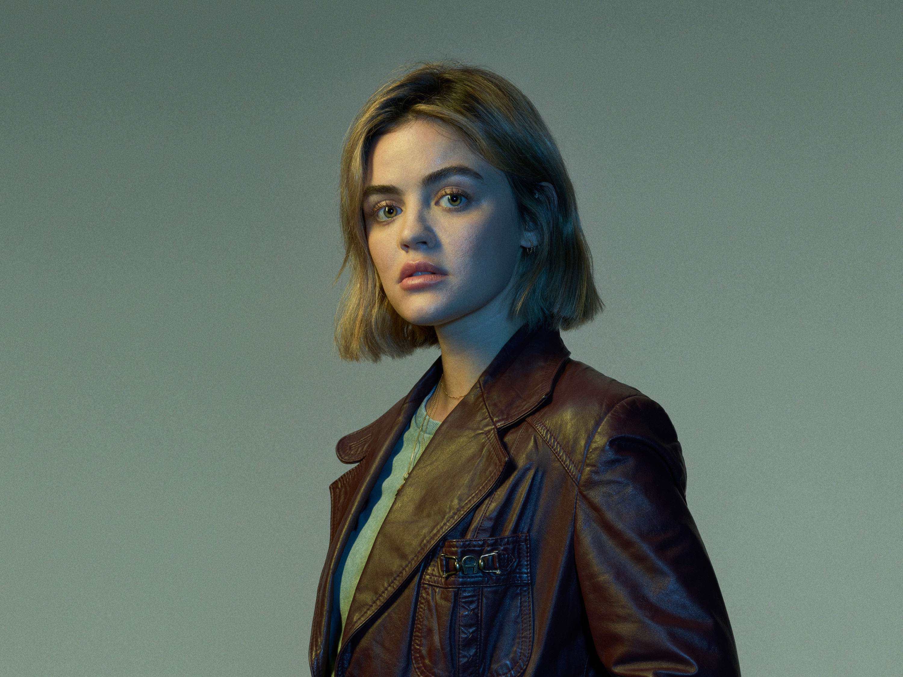 Lucy Hale in a brown leather jacket HD Wallpaper