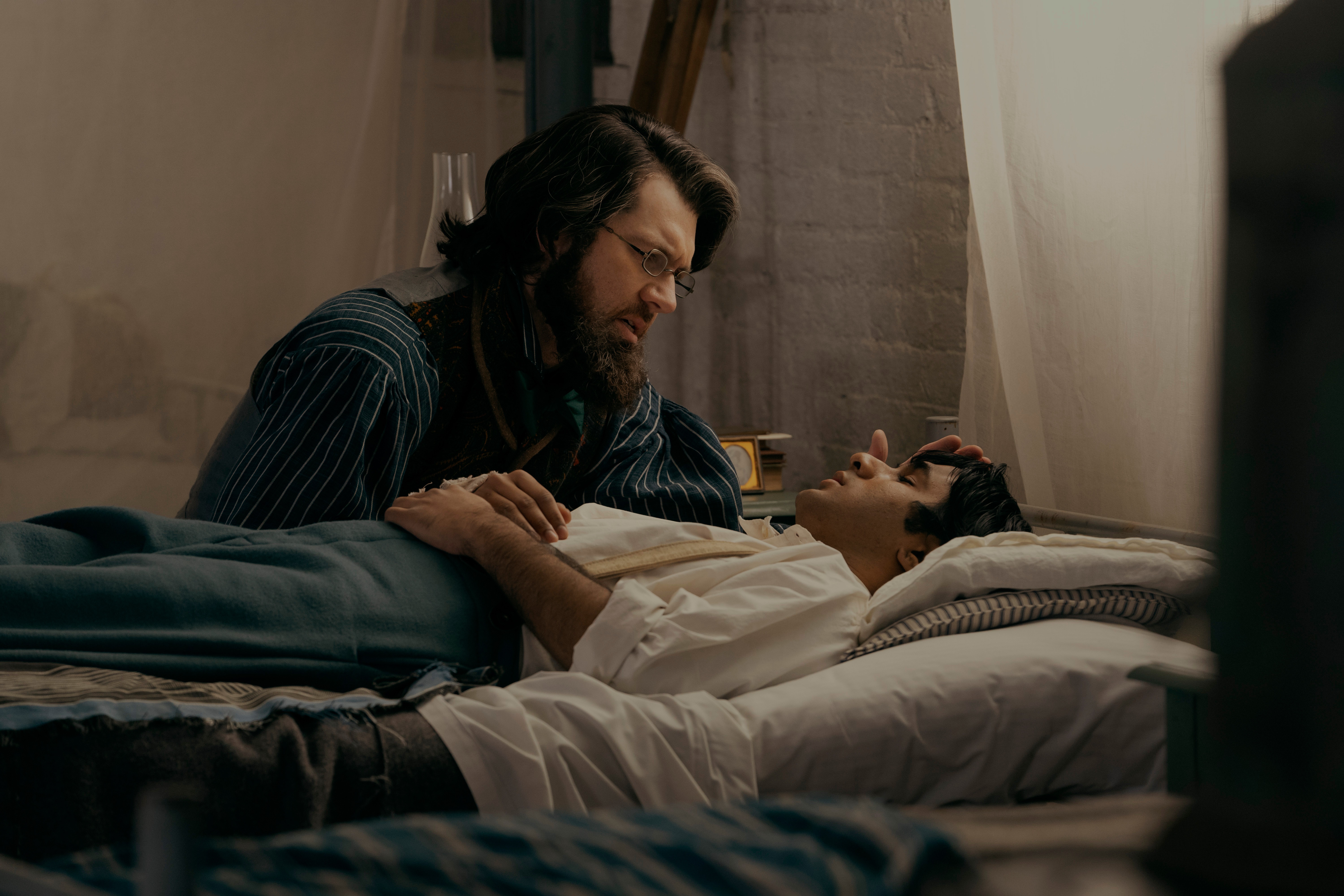 Man tending to a sick man in bed, Dickinson 4K HD Wallpaper