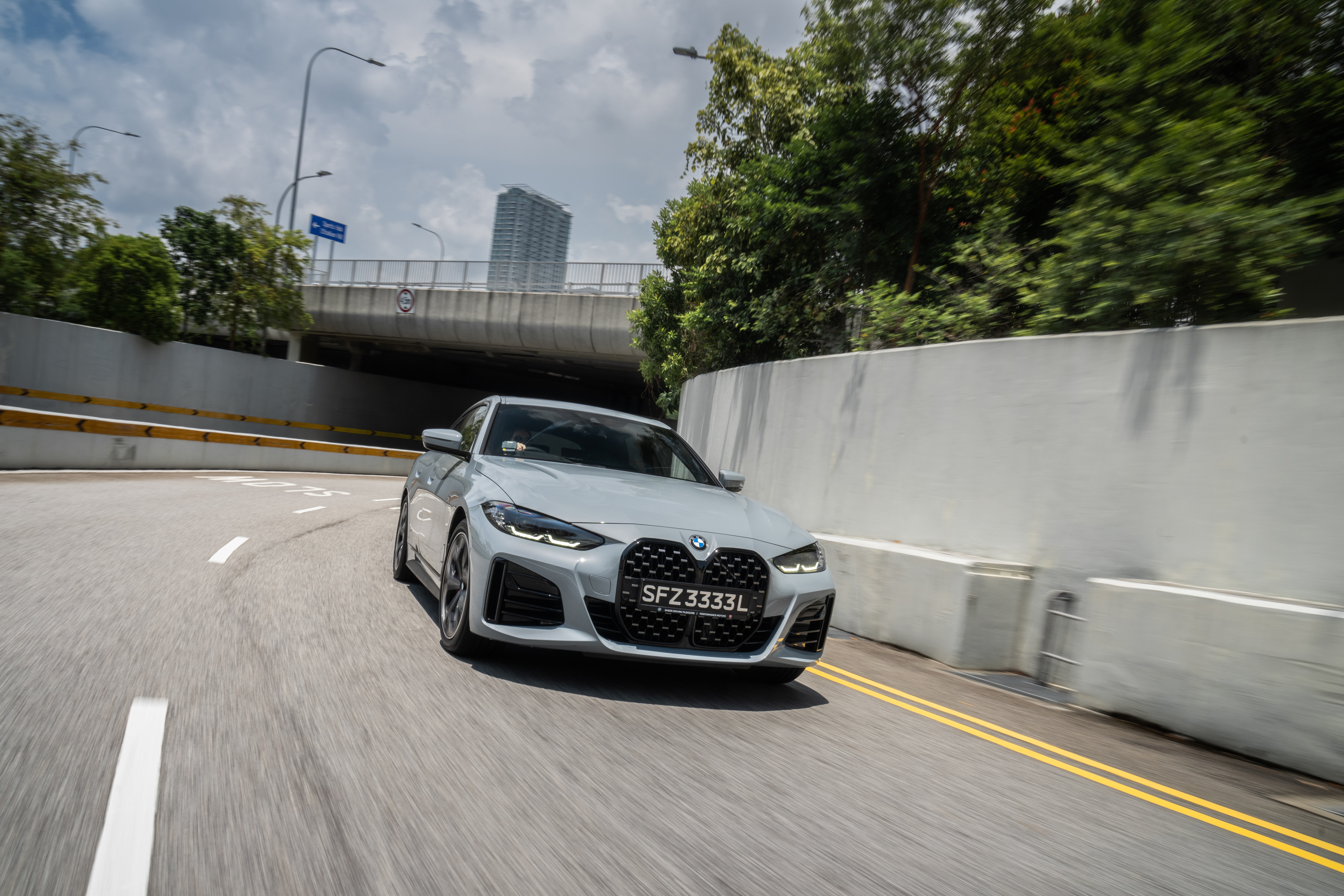 BMW 4 Series Gran Coupé M Sport driving on road HD Wallpaper
