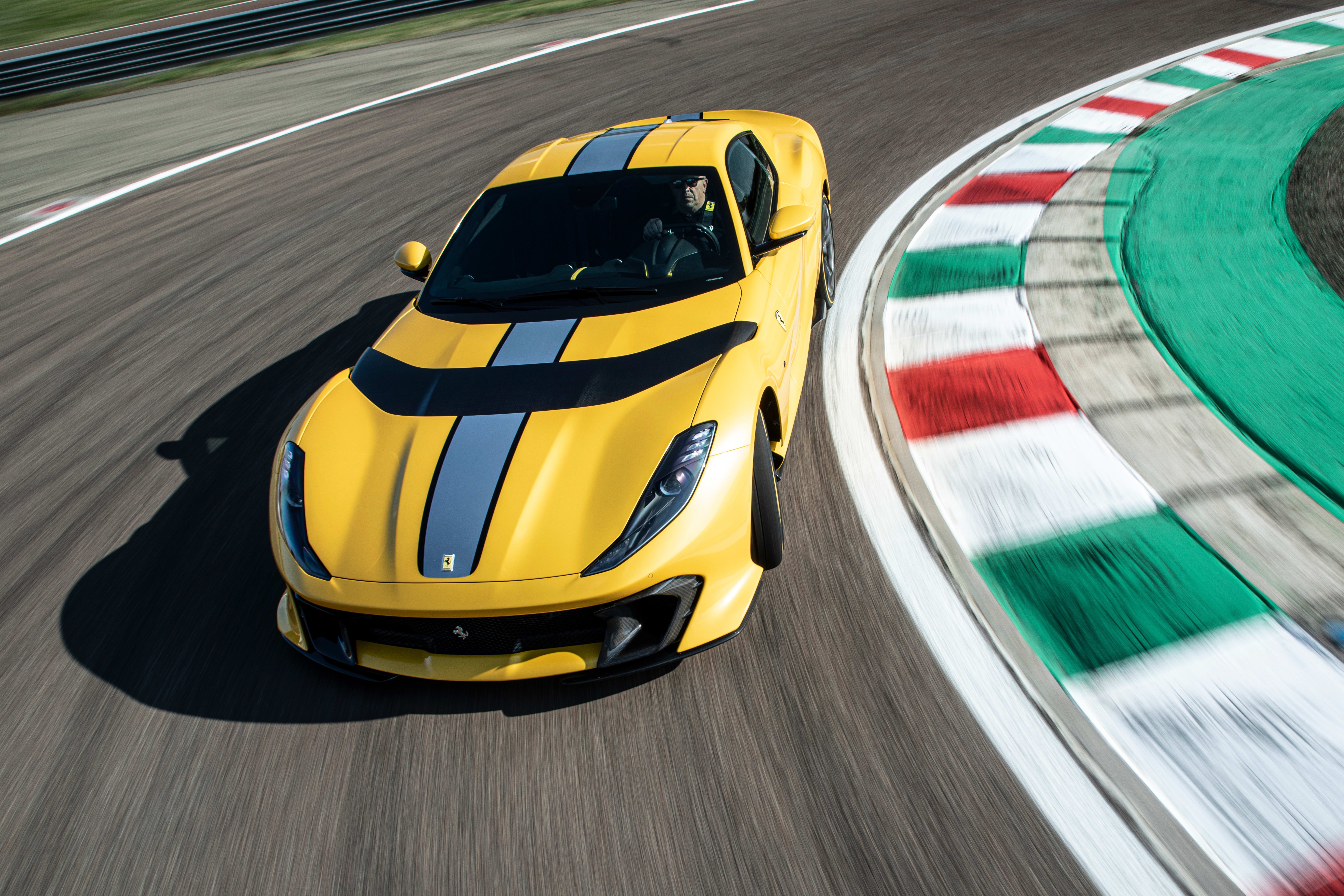 Yellow Ferrari 812 Competizione on a Race Track 4K HD Wallpaper