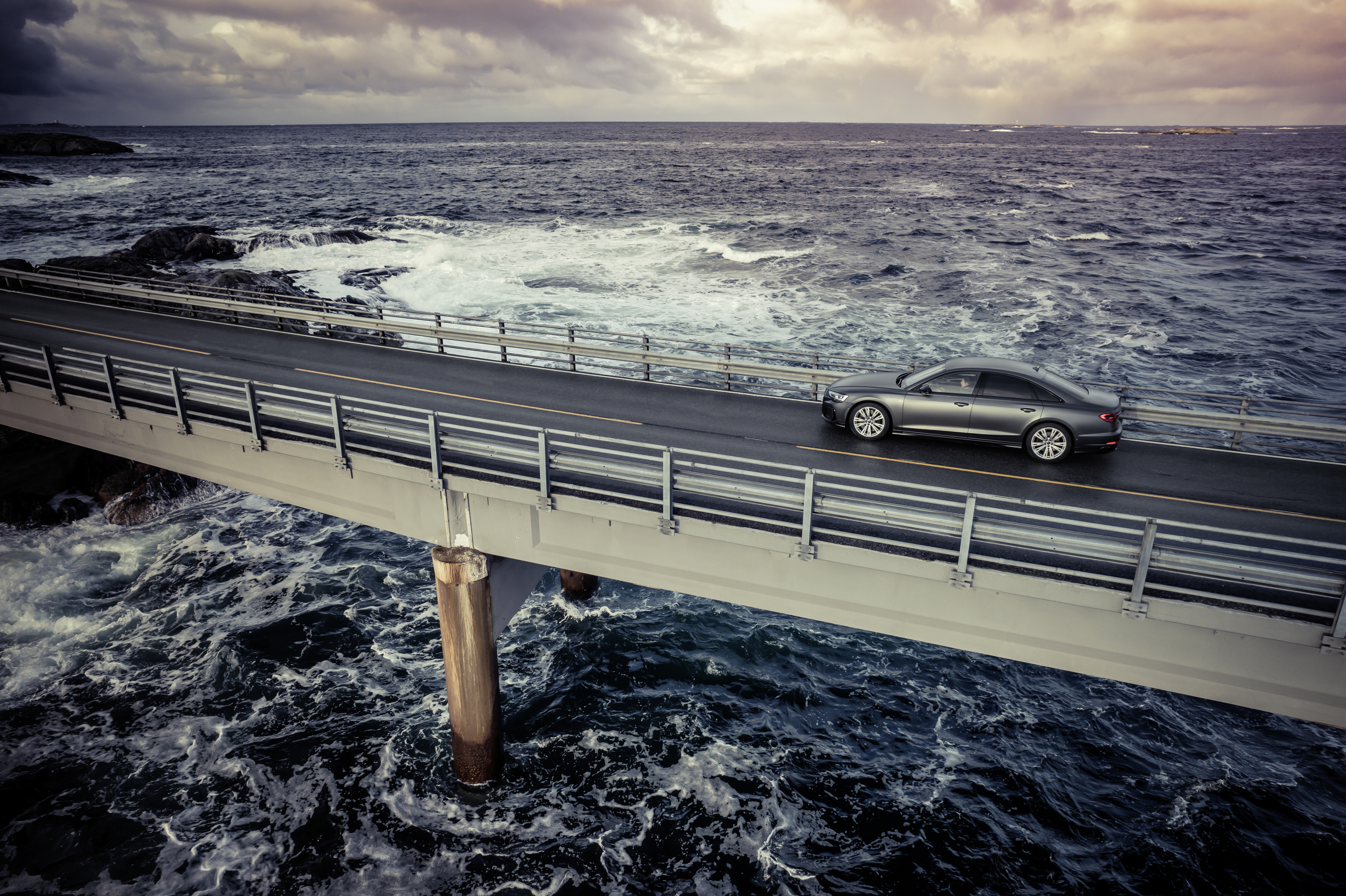 Audi A8 quattro S line on a bridge over the ocean HD Wallpaper