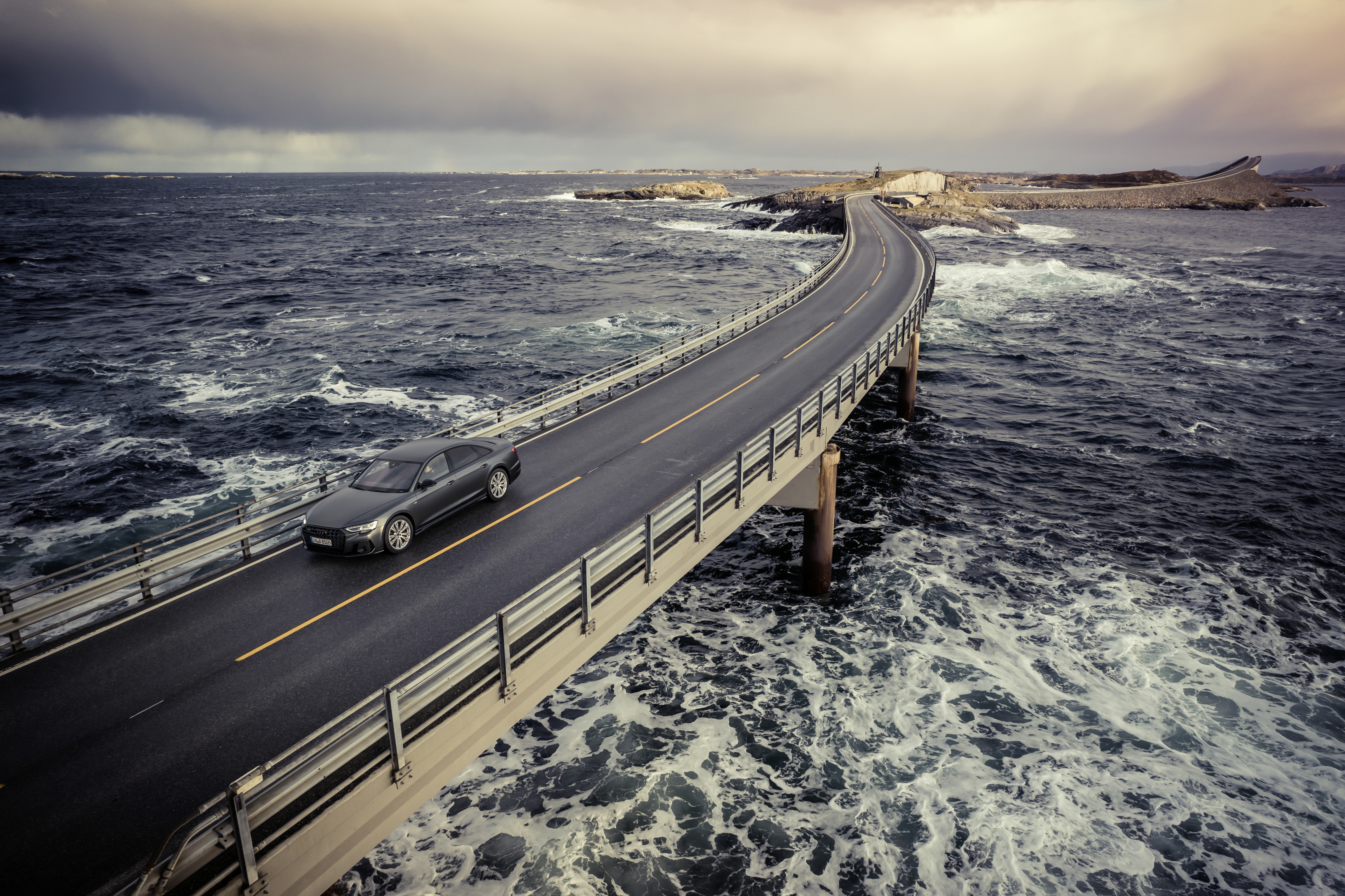 Audi A8 quattro S line on a bridge over the ocean HD Wallpaper