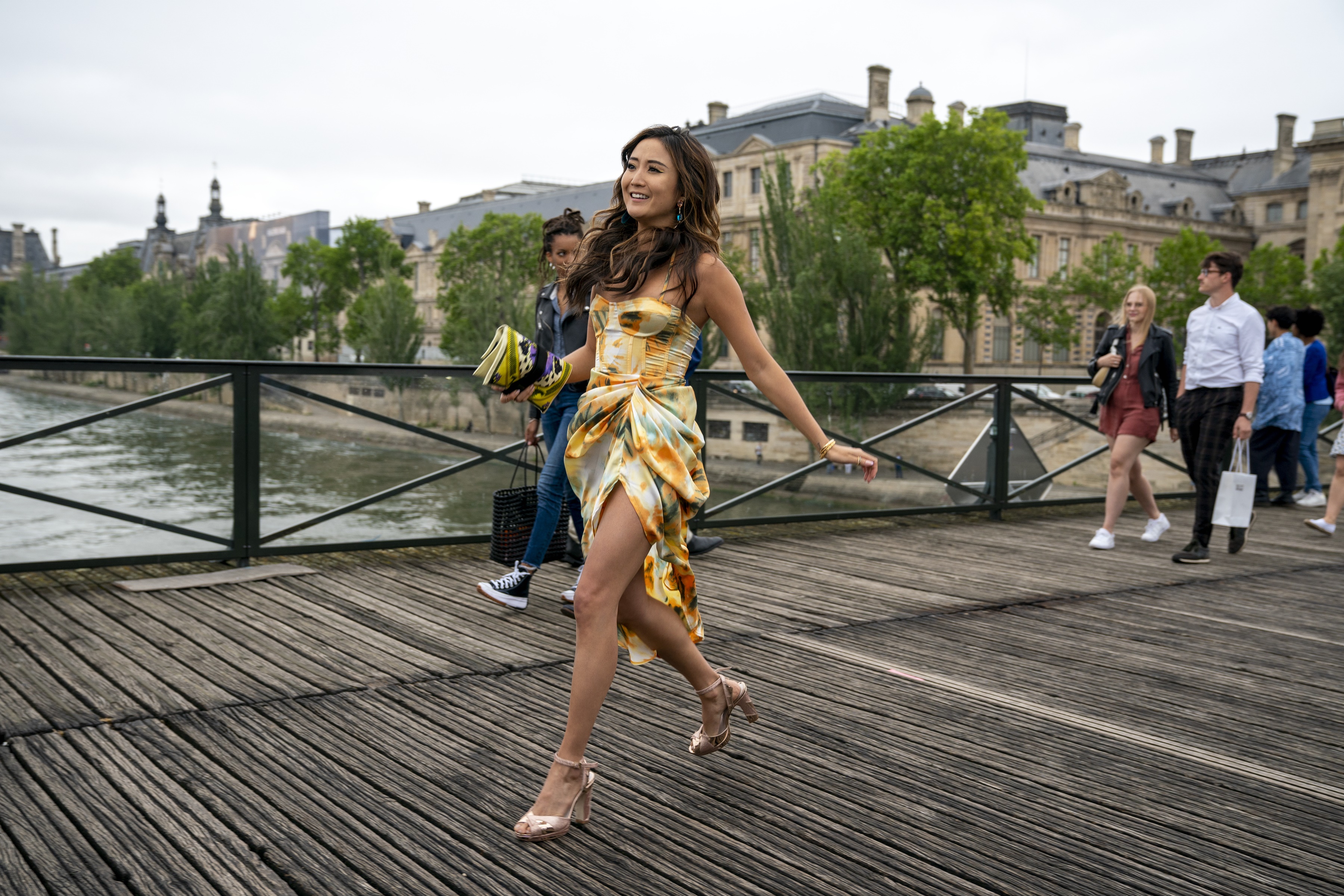 Mindy Chen from Emily in Paris on a bridge HD Wallpaper
