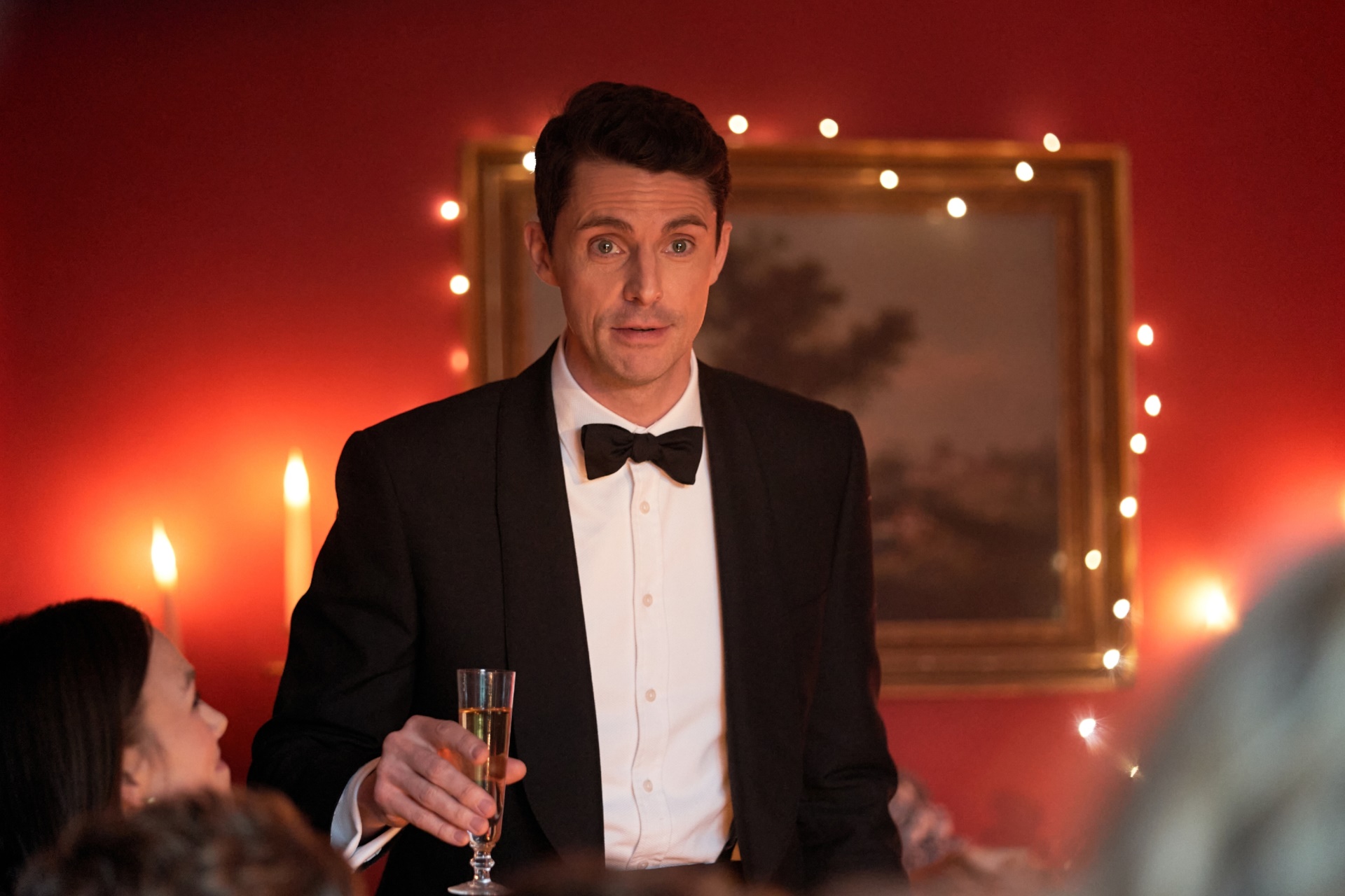Matthew Goode in a tuxedo holding champagne HD Wallpaper