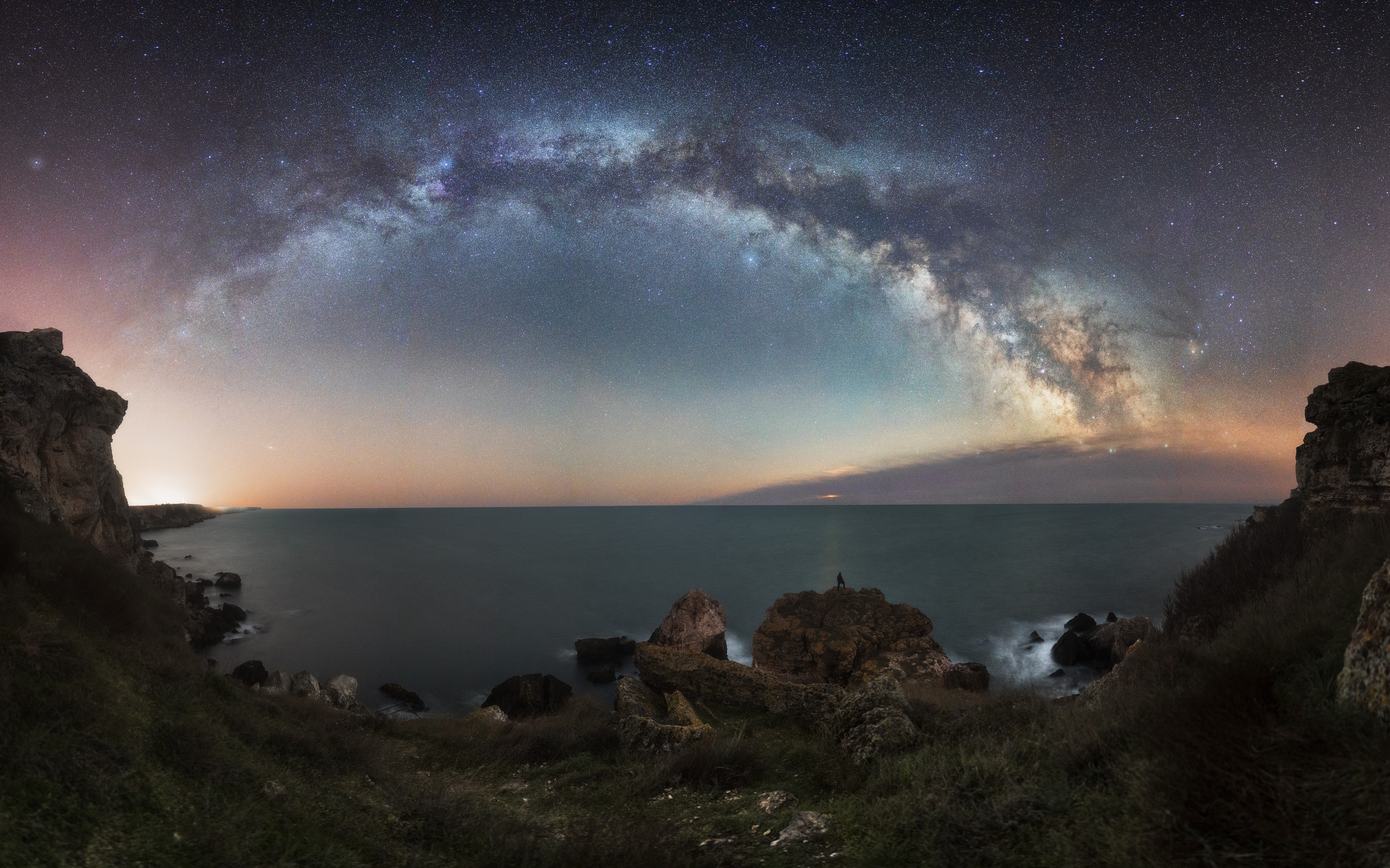 Milky Way over rocky coast at night HD Wallpaper
