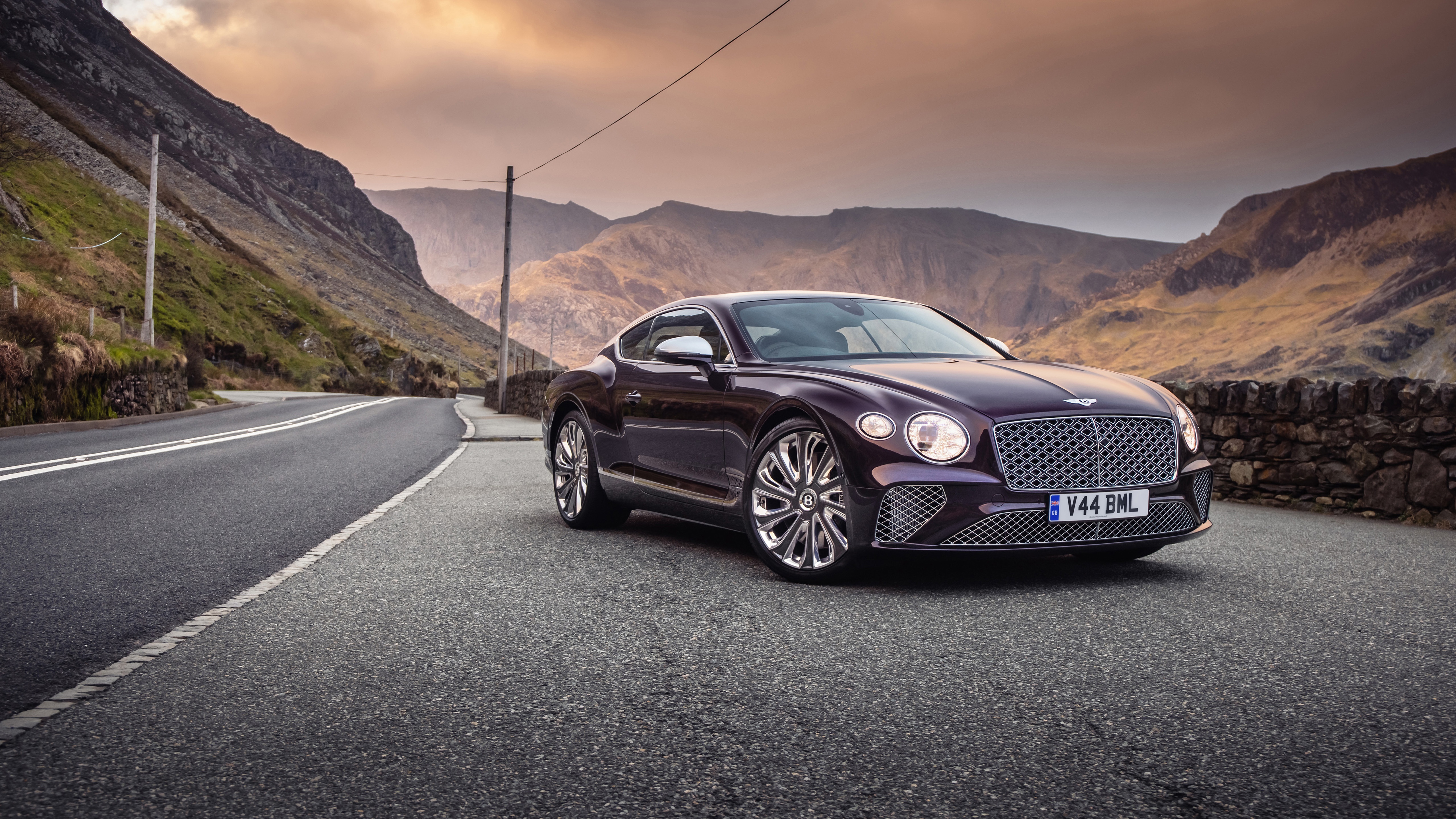 Bentley Continental GT 4K on a mountain road HD Wallpaper