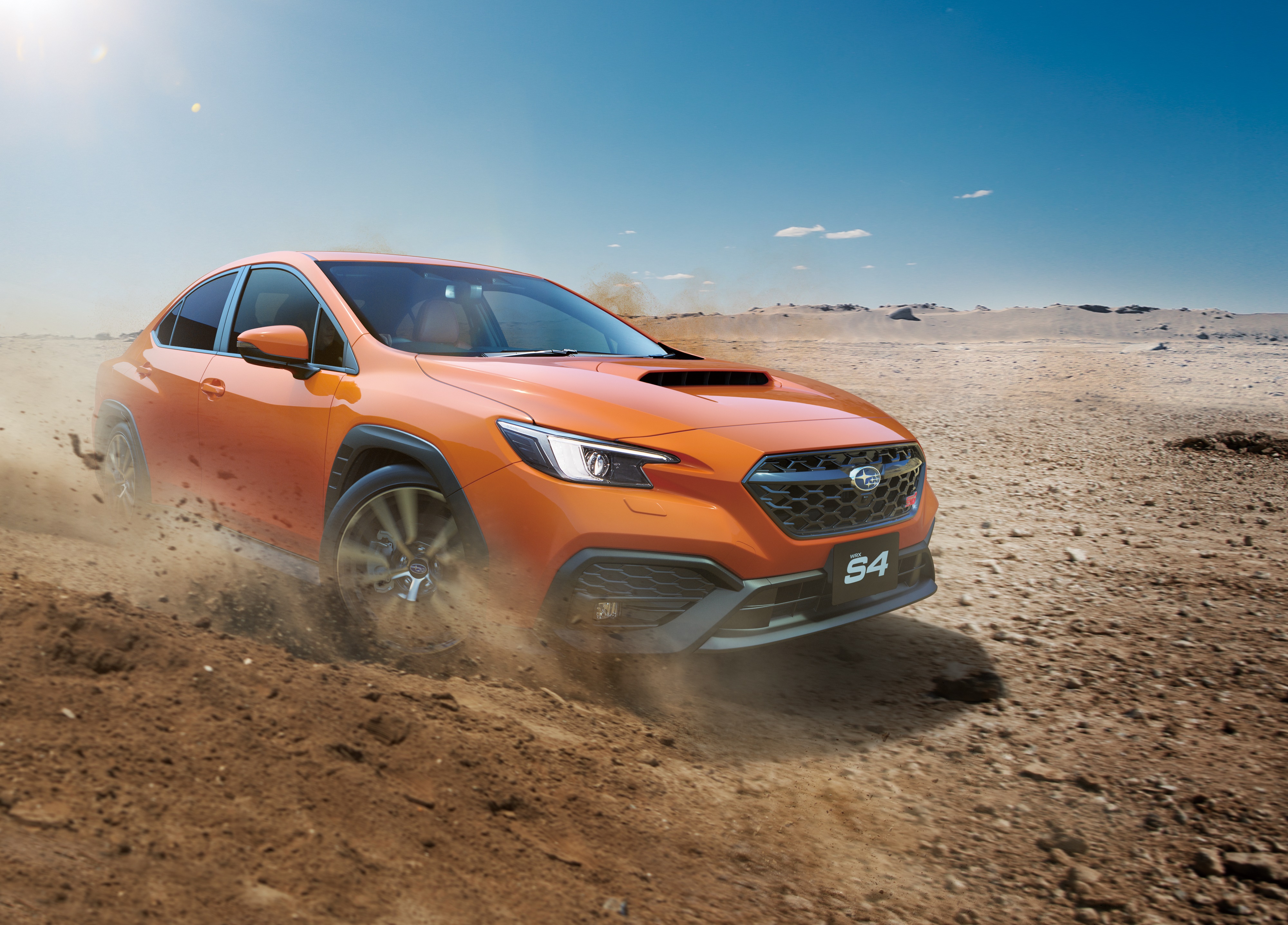 Orange Subaru WRX S4 STI Sport R driving on dirt HD Wallpaper