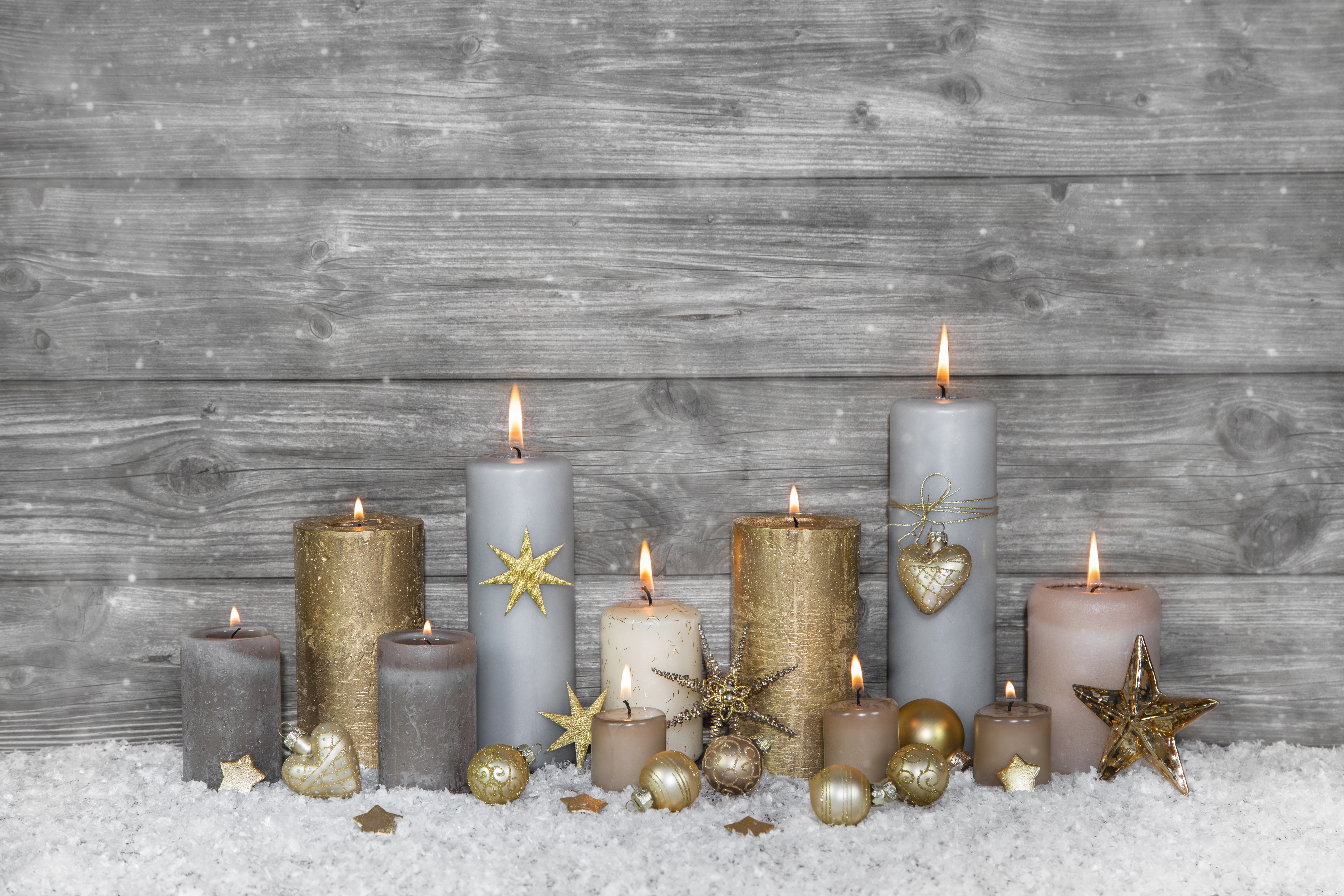Christmas Candles with Ornaments on Wooden Background 4K HD Wallpaper