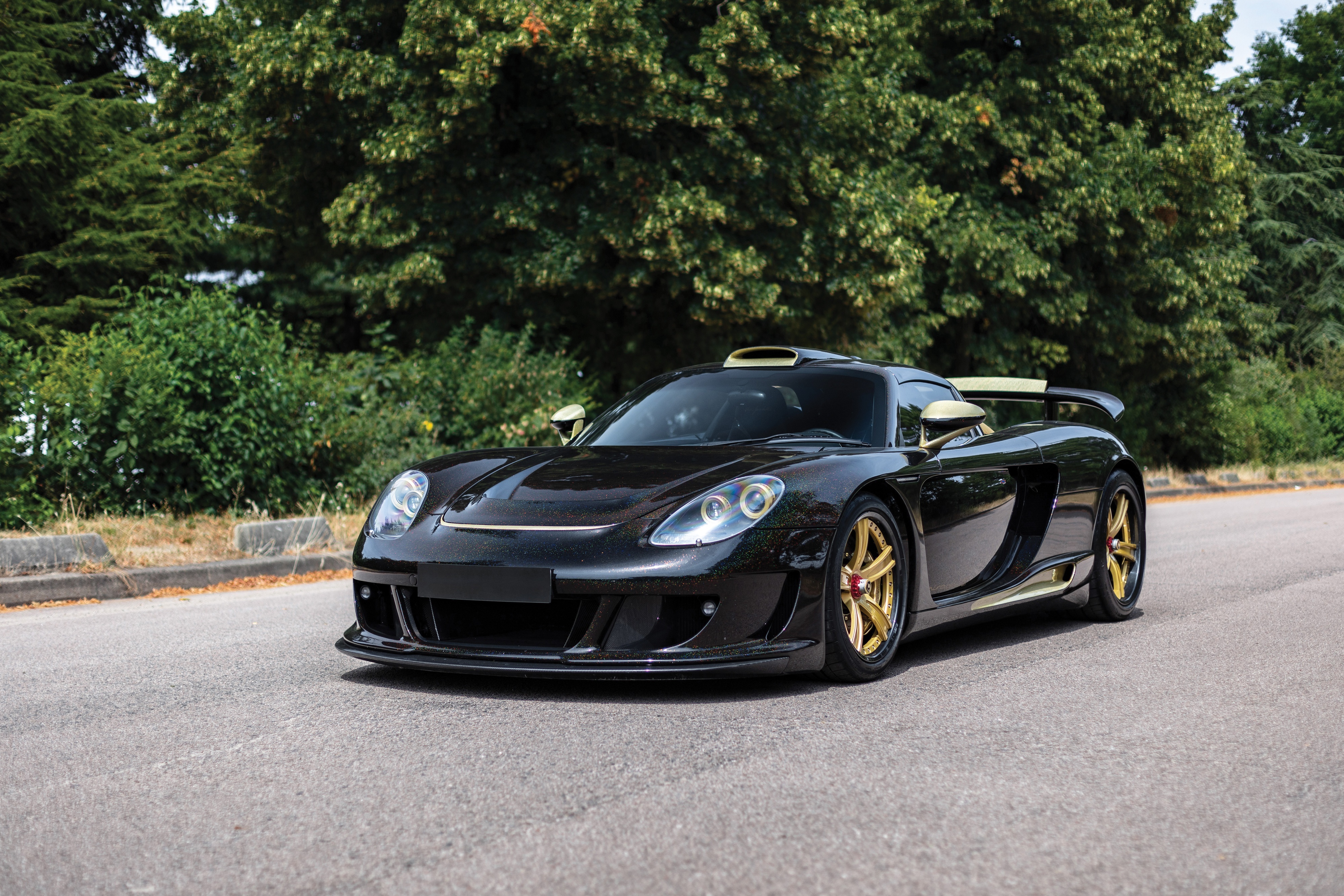 Black Porsche Carrera GT 4K HD Wallpaper