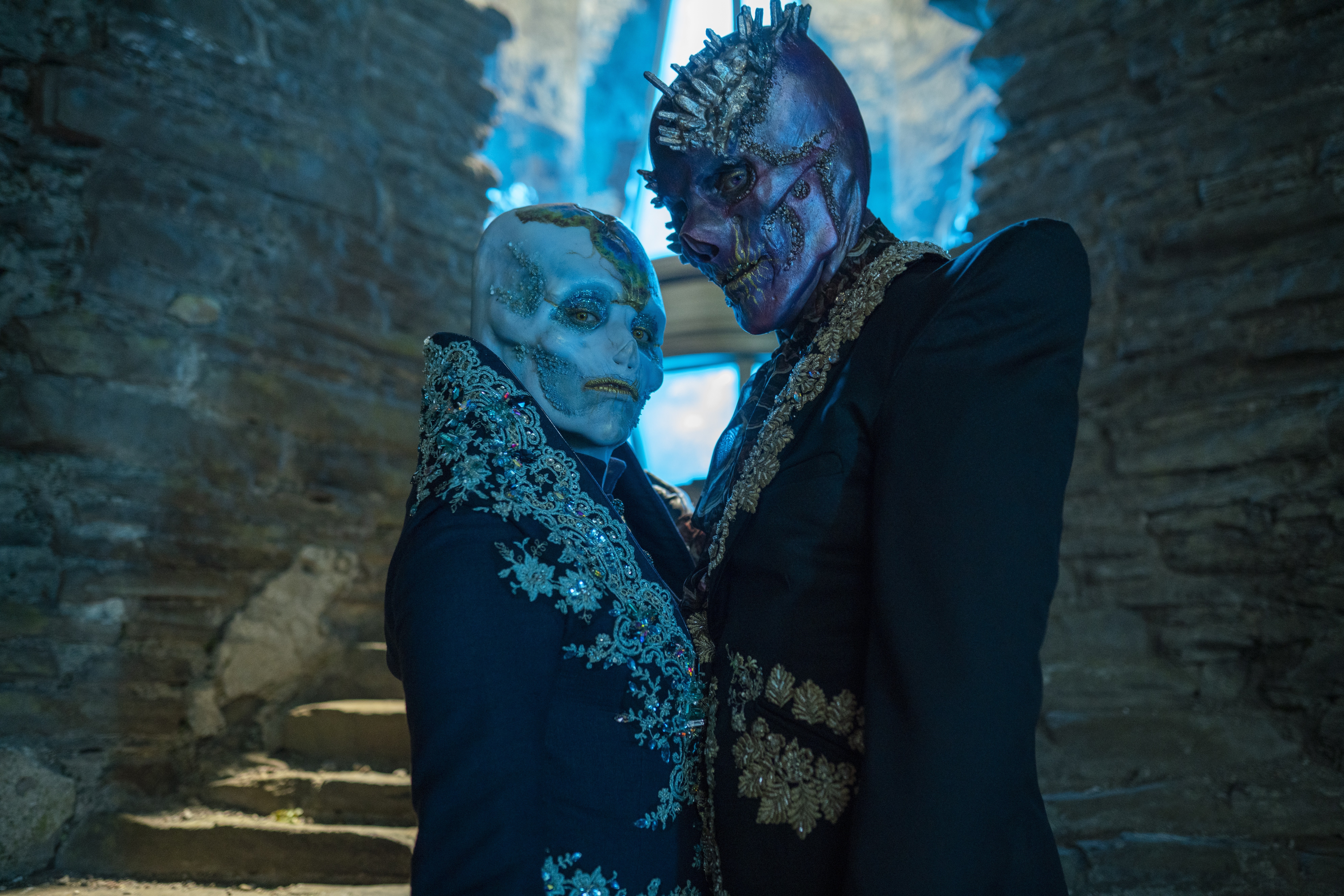 Two figures with elaborate masks and costumes in Doctor Who HD Wallpaper
