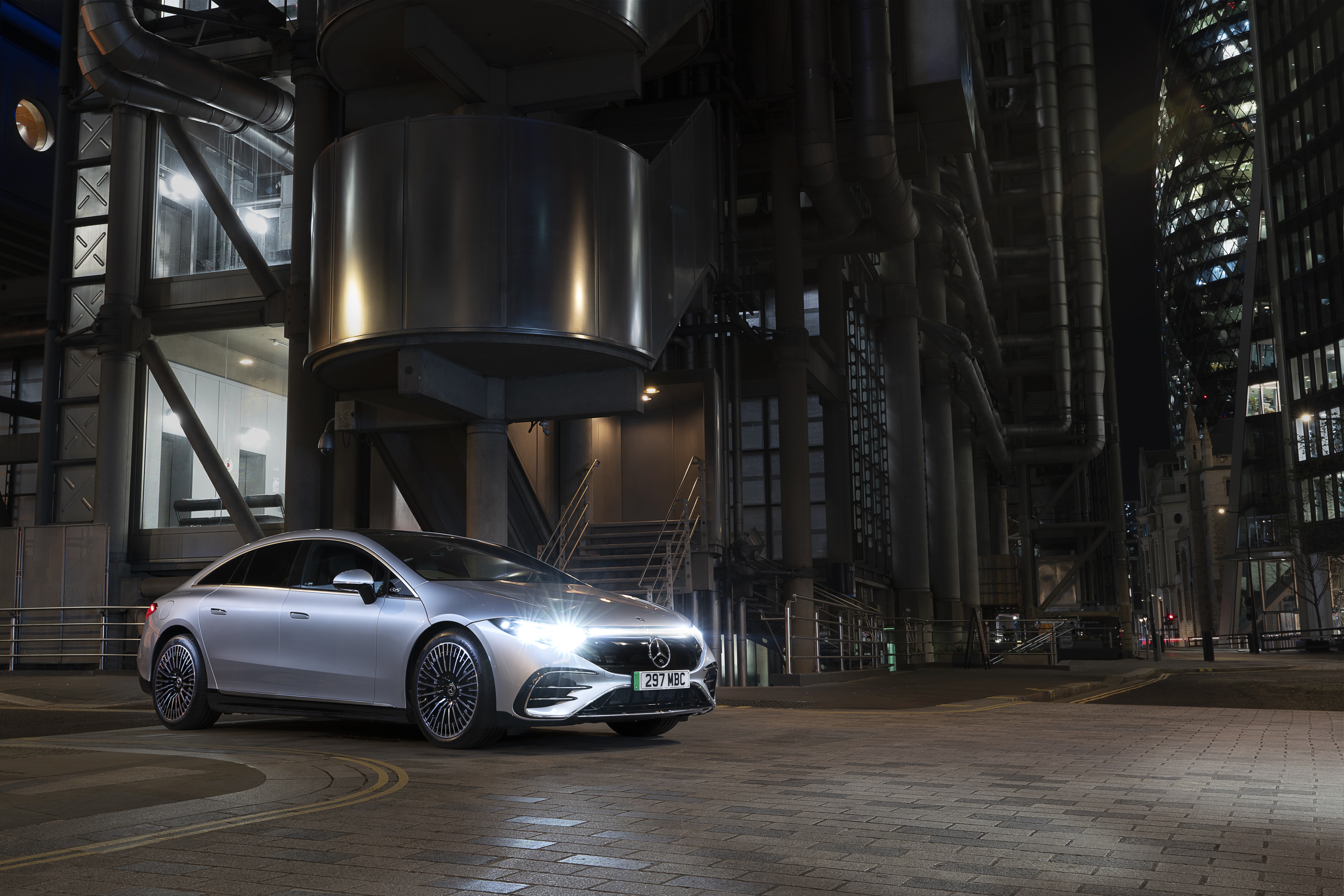 Silver Mercedes-Benz EQS 450 AMG Line parked at night HD Wallpaper