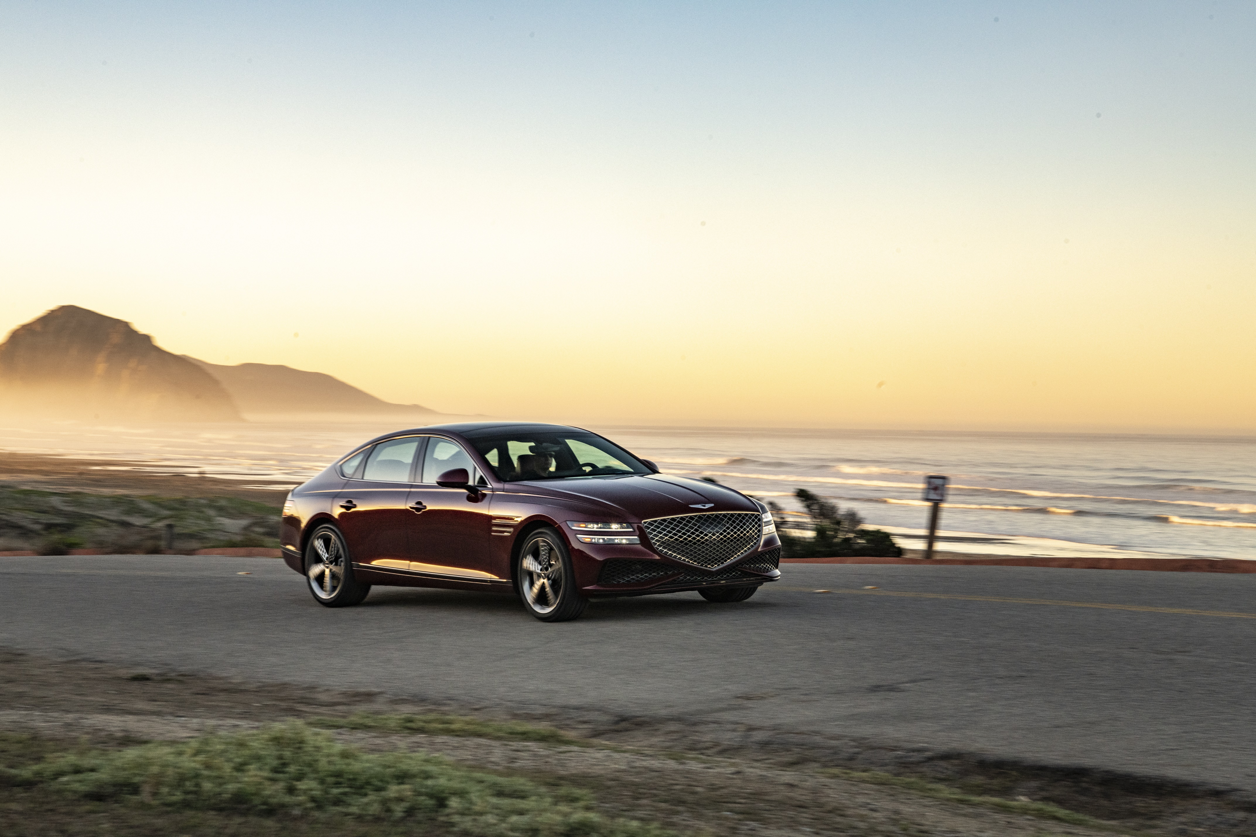 Genesis G80 4K 3.5T AWD Sport on coastal road HD Wallpaper