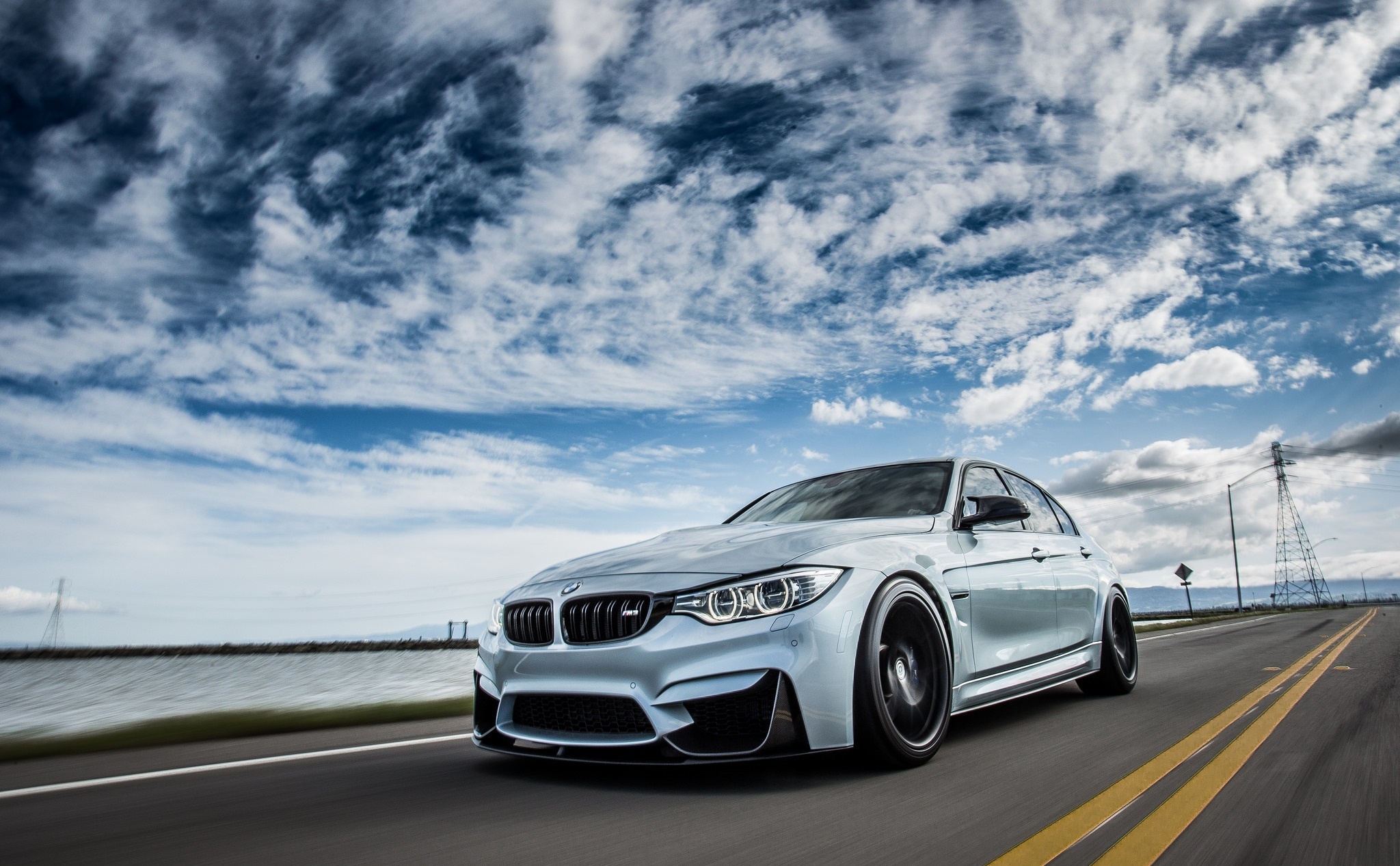 Silver BMW M3 Sedan Driving on Road HD Wallpaper