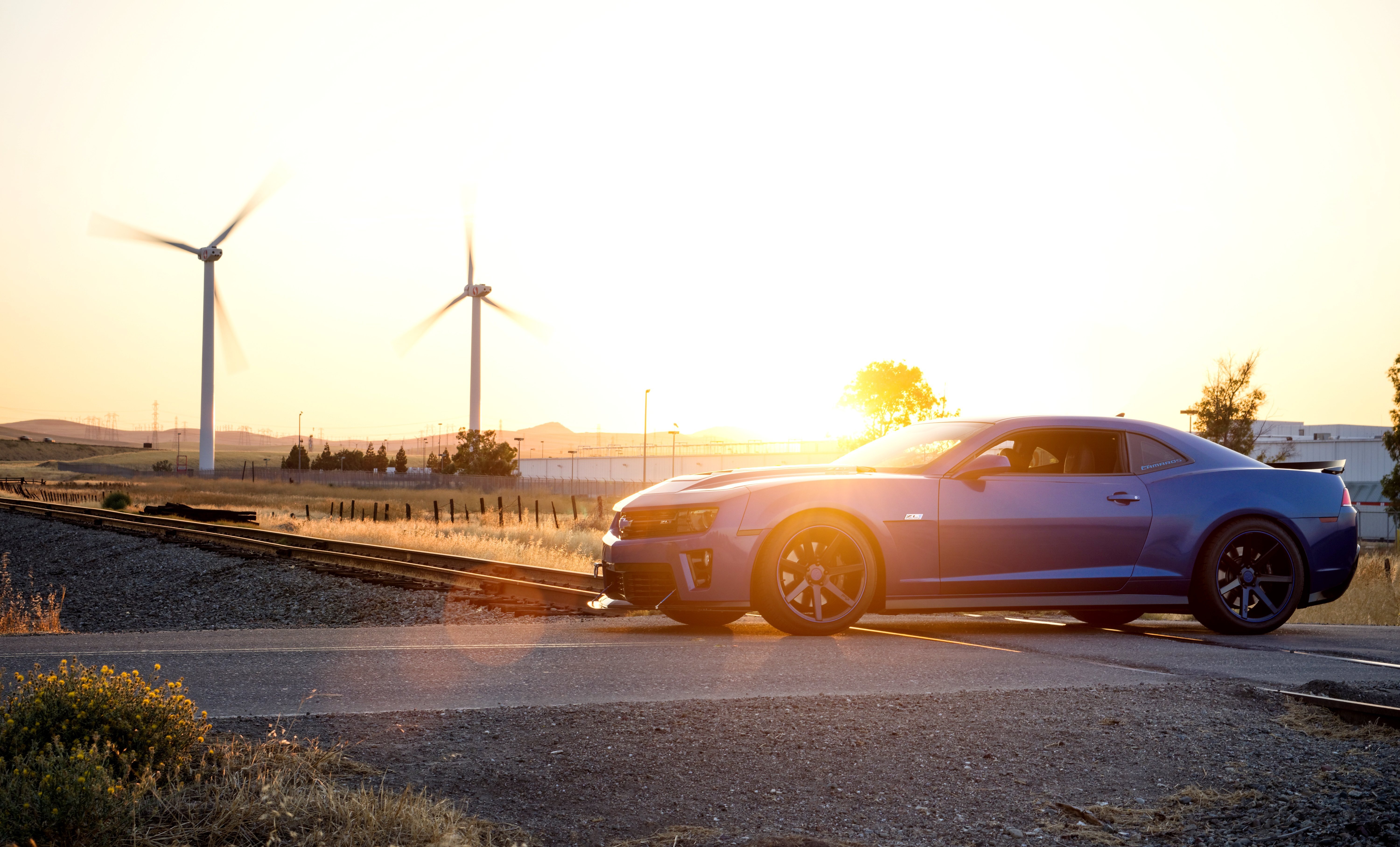 Blue Chevrolet Camaro ZL1 4K near wind turbines HD Wallpaper