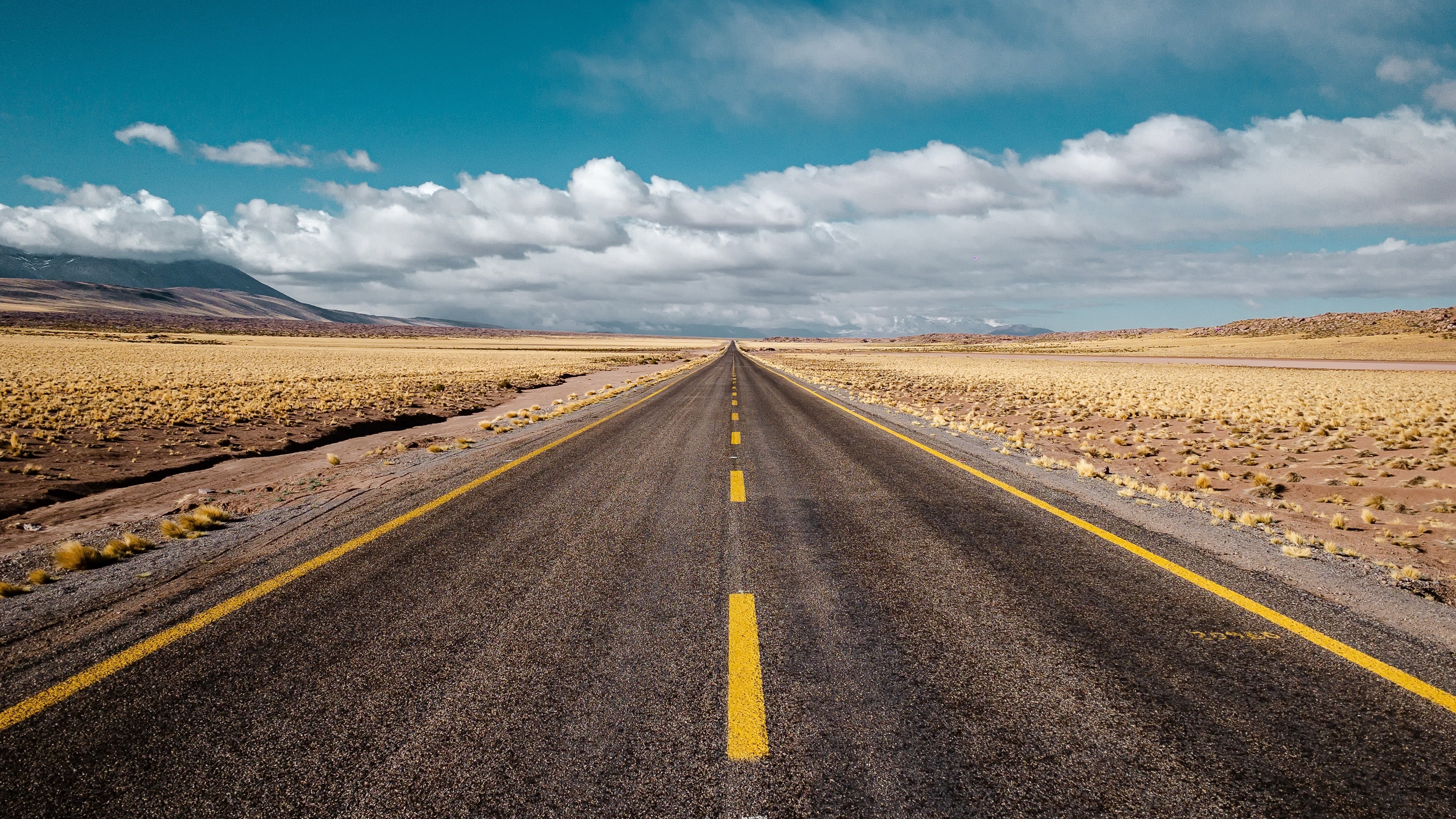 Empty Desert Road with Yellow Lines 4K HD Wallpaper