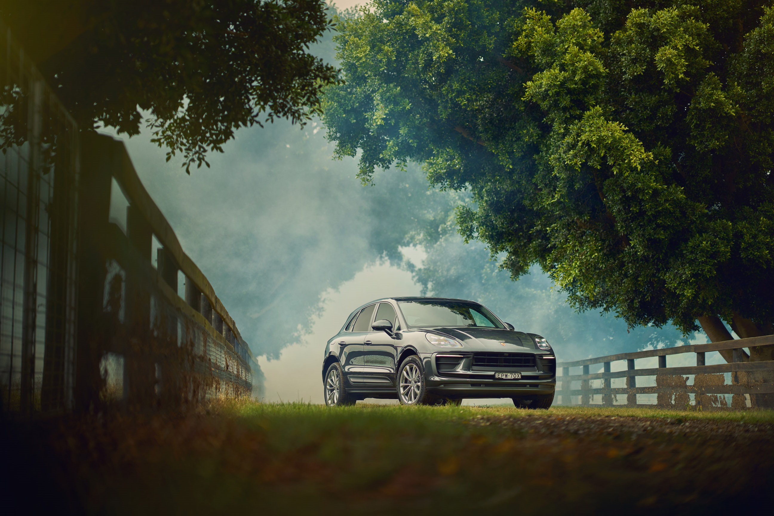Porsche Macan SUV on a grassy path HD Wallpaper
