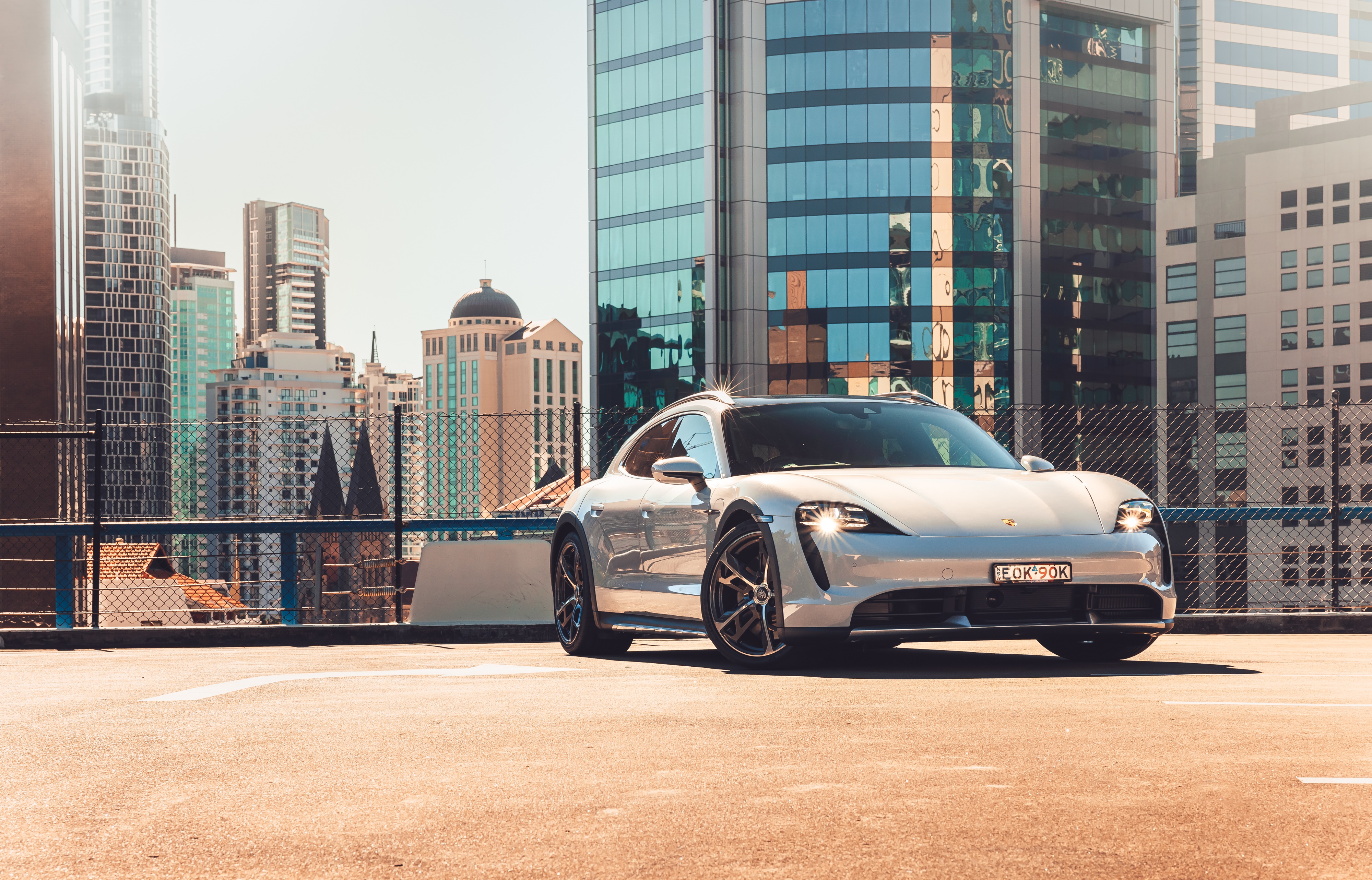 Porsche Taycan Turbo Cross Turismo in city HD Wallpaper