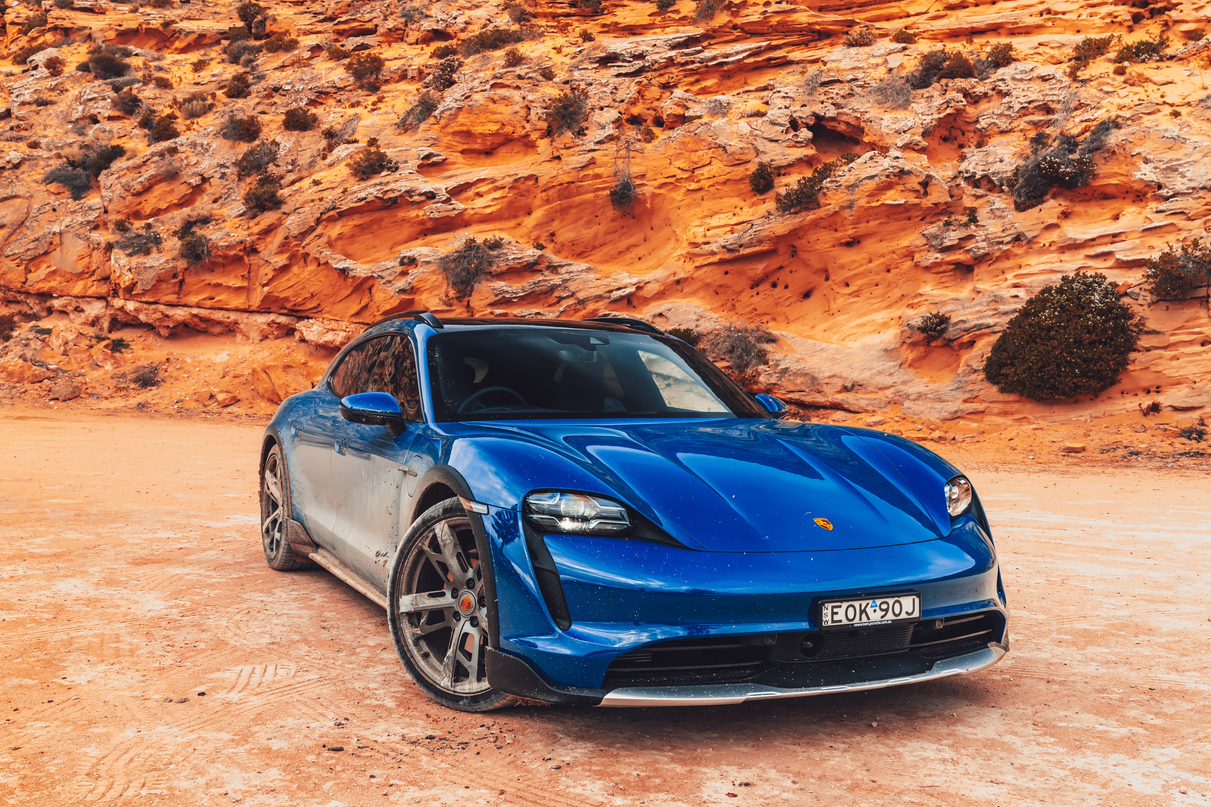 Blue Porsche Taycan 4S Cross Turismo in desert HD Wallpaper