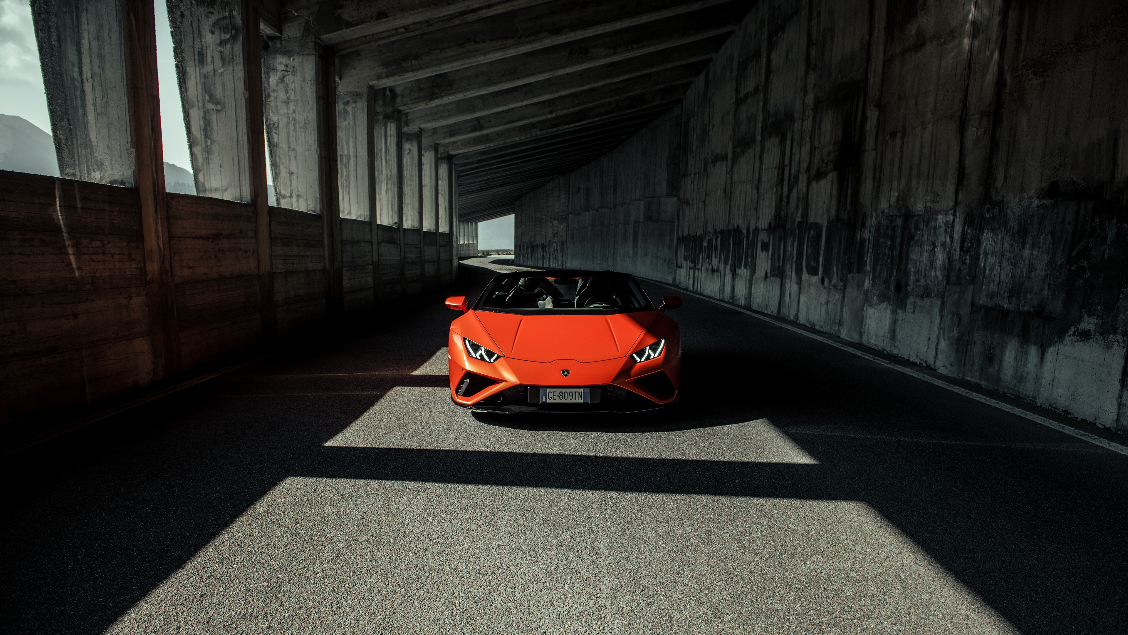 Orange Lamborghini Huracán Evo 4K in tunnel HD Wallpaper