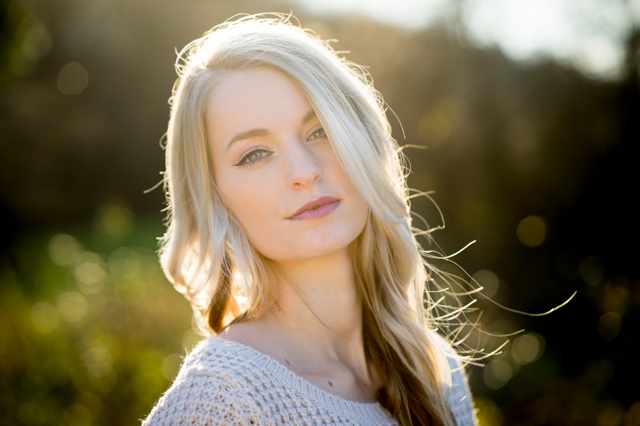 Woman with blonde hair in a sweater HD Wallpaper