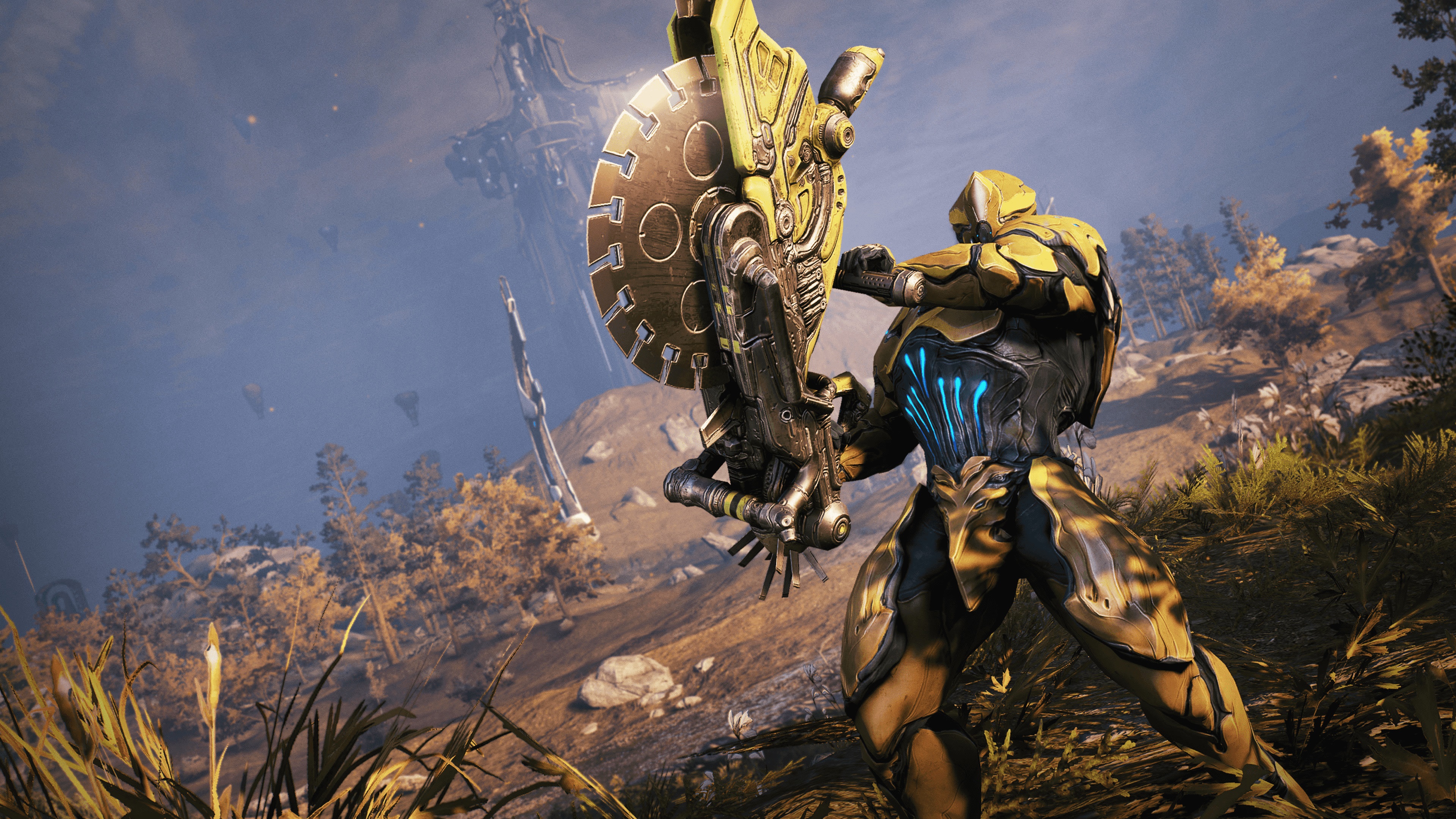Warframe character with large weapon in landscape 4K HD Wallpaper