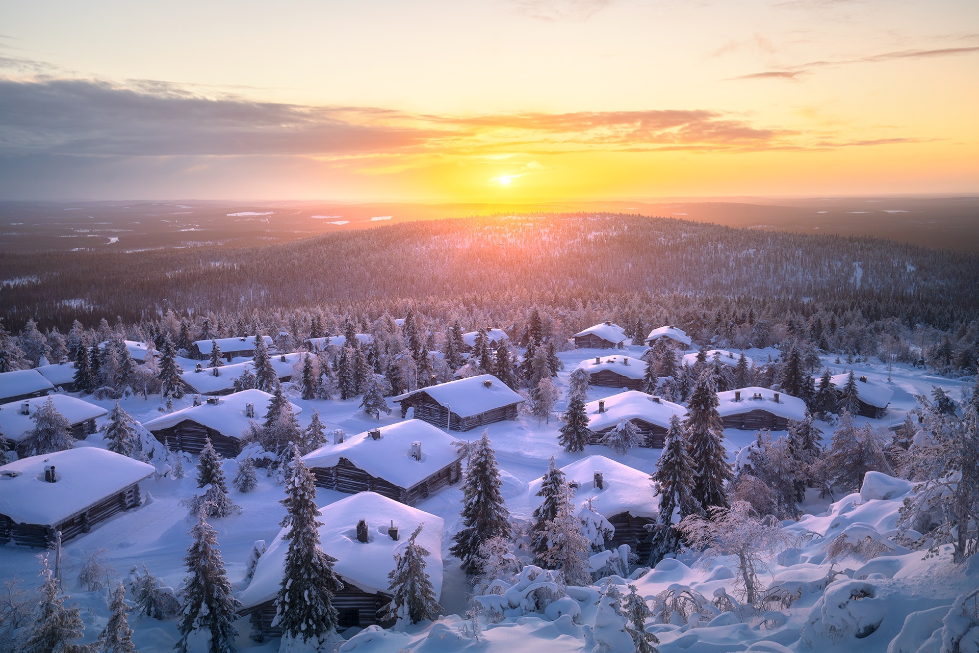 Snowy cabins in a forest at sunrise HD Wallpaper