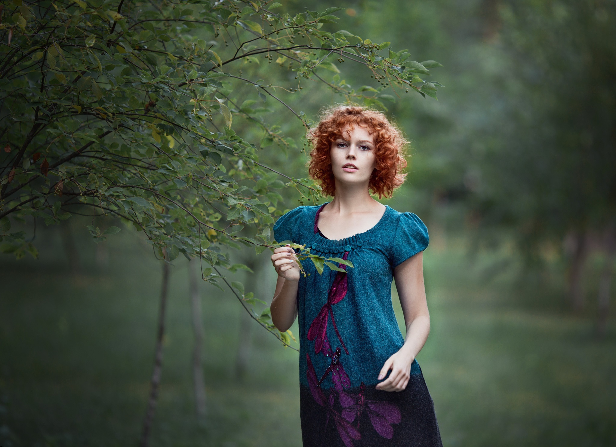 Redhead woman in a teal dress in a forest HD Wallpaper