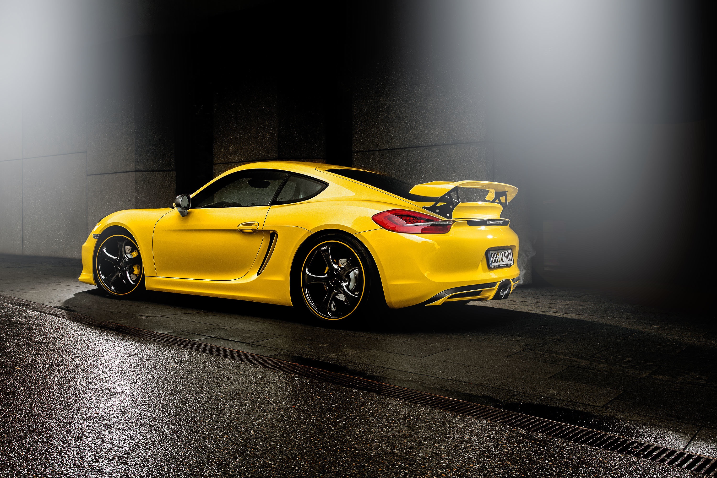 Yellow Porsche Cayman with Spoiler HD Wallpaper