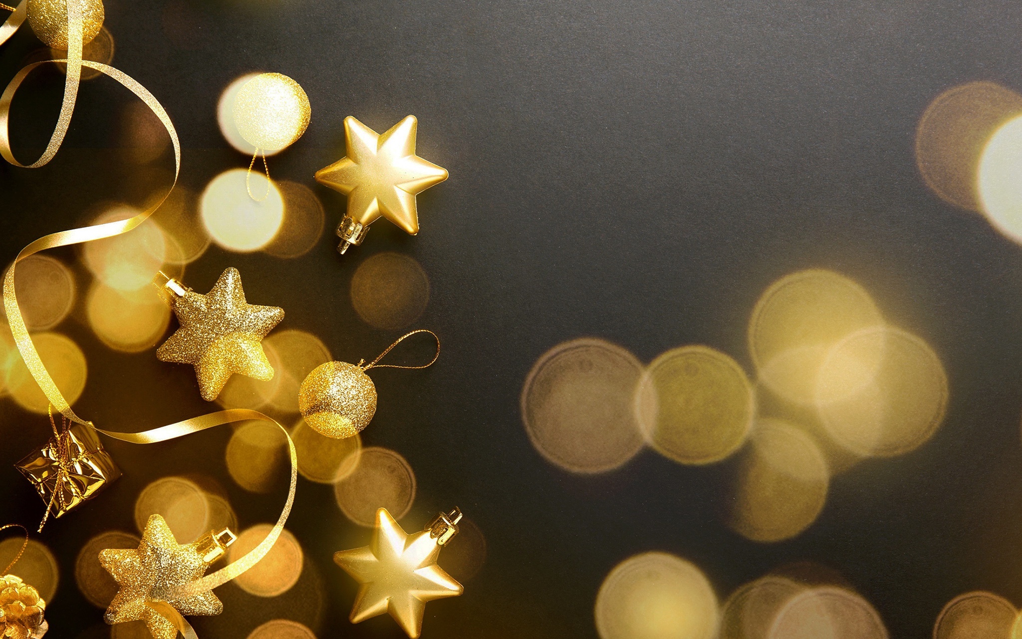 Golden Christmas Ornaments and Ribbon on Black Background HD Wallpaper