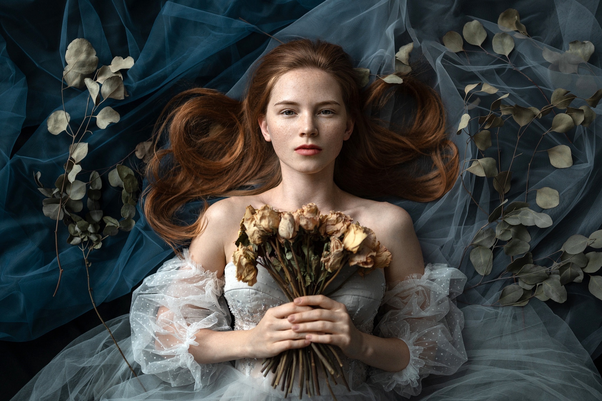 Redhead woman lying down with dried flowers HD Wallpaper