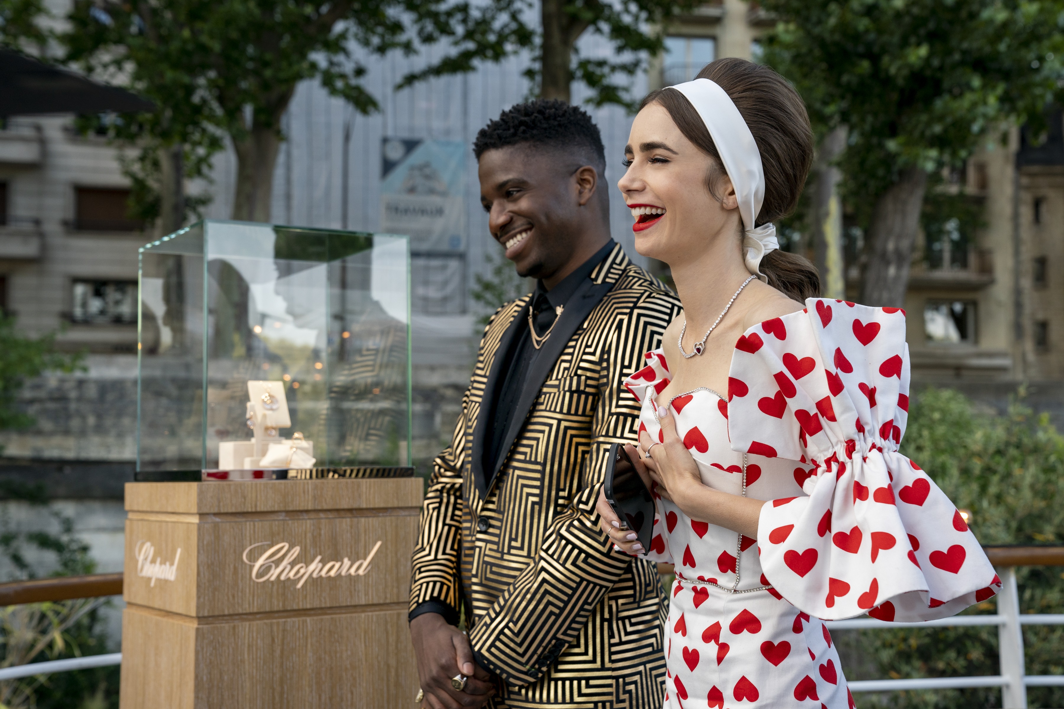 Lily Collins and Lucien Laviscount at Chopard event HD Wallpaper