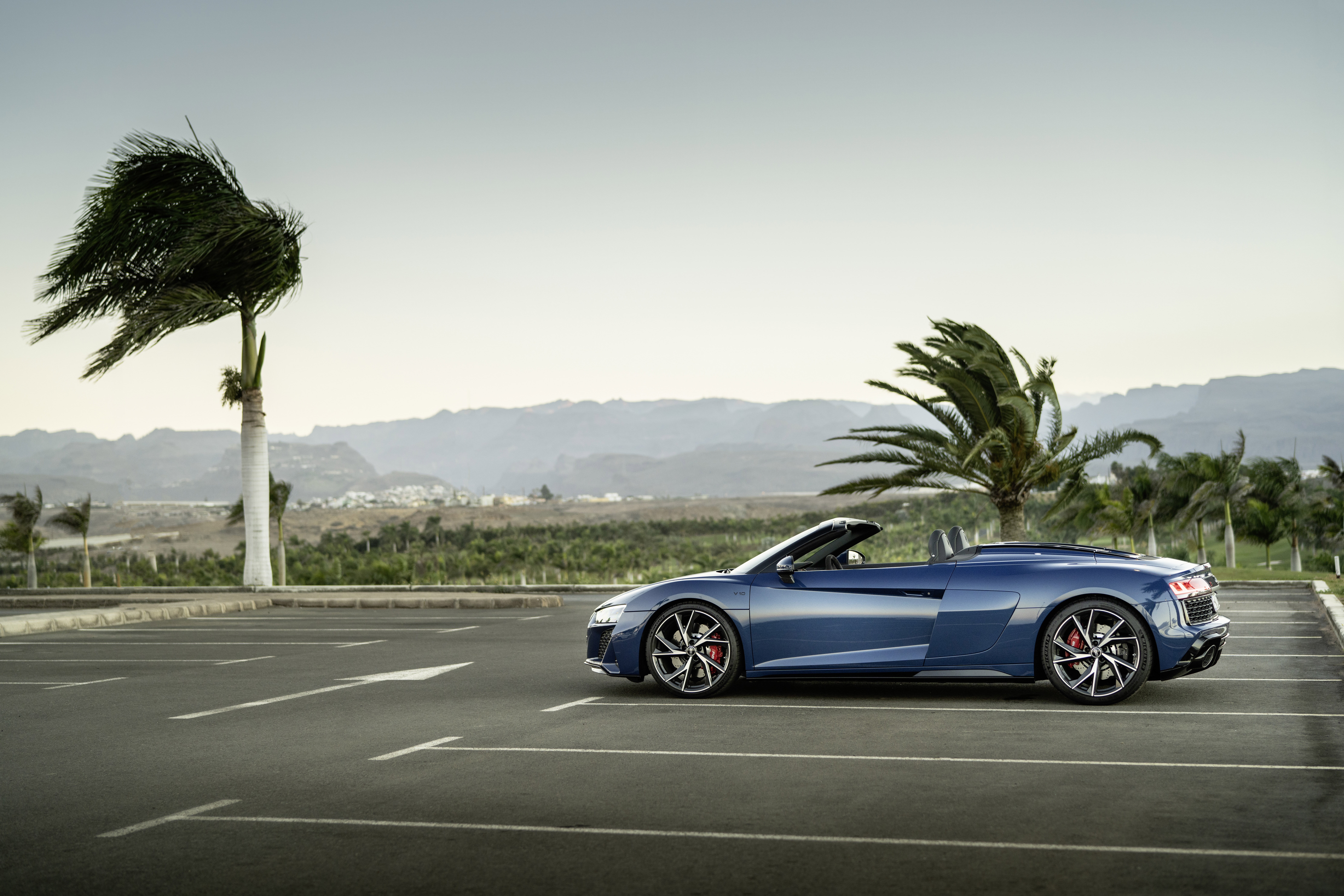 Blue Audi R8 V10 Cabriolet parked in a lot HD Wallpaper