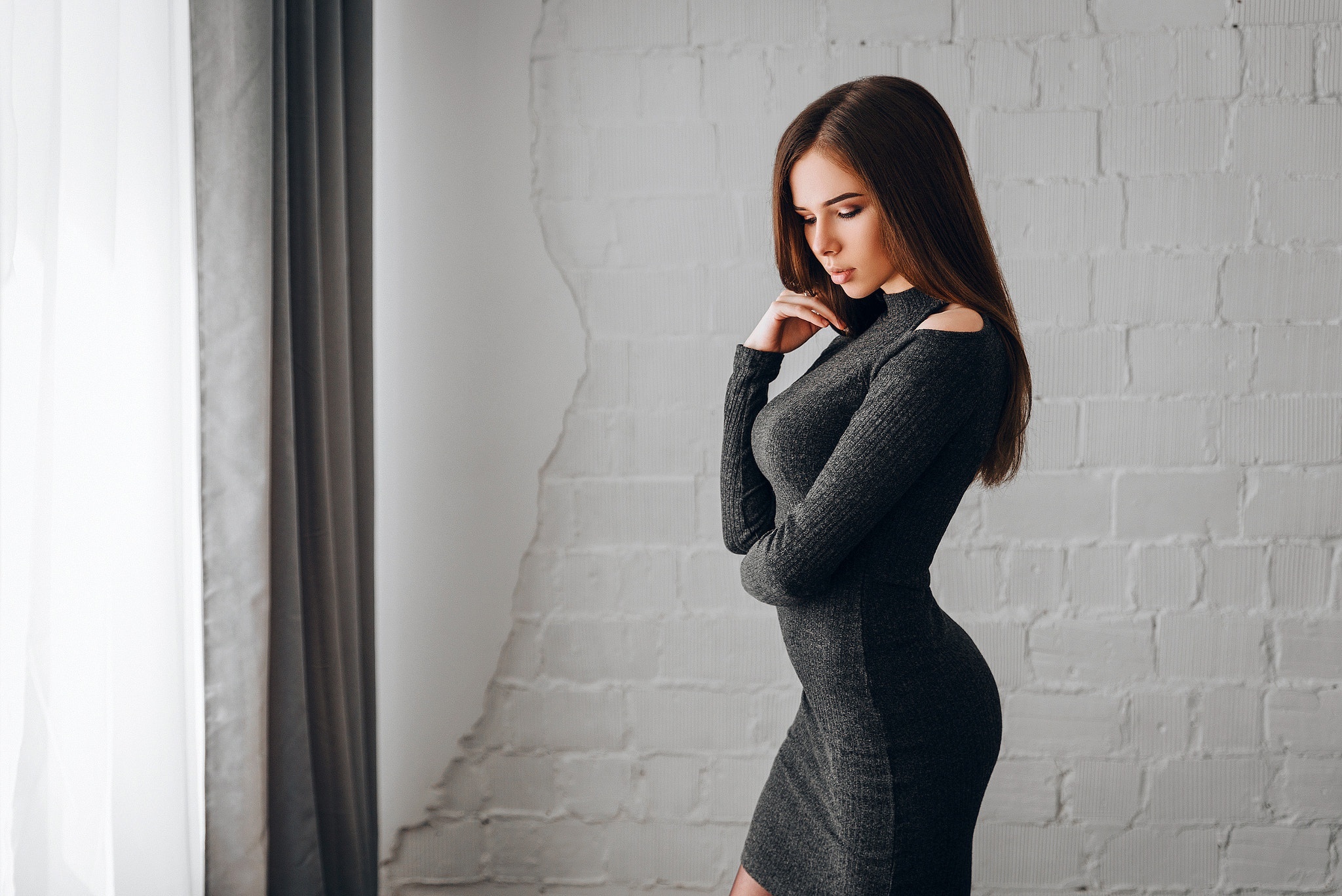 Brunette woman in a dark dress HD Wallpaper
