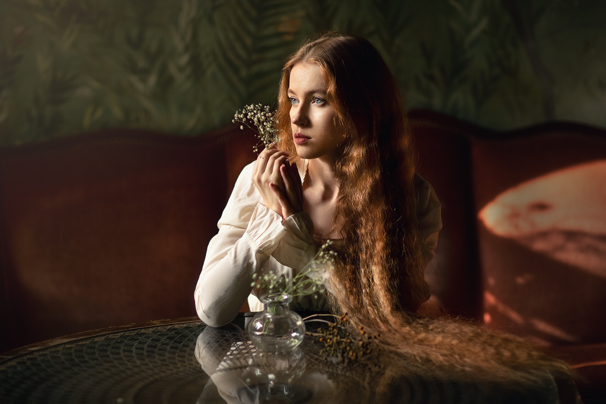 Redhead woman with long hair holding flowers HD Wallpaper