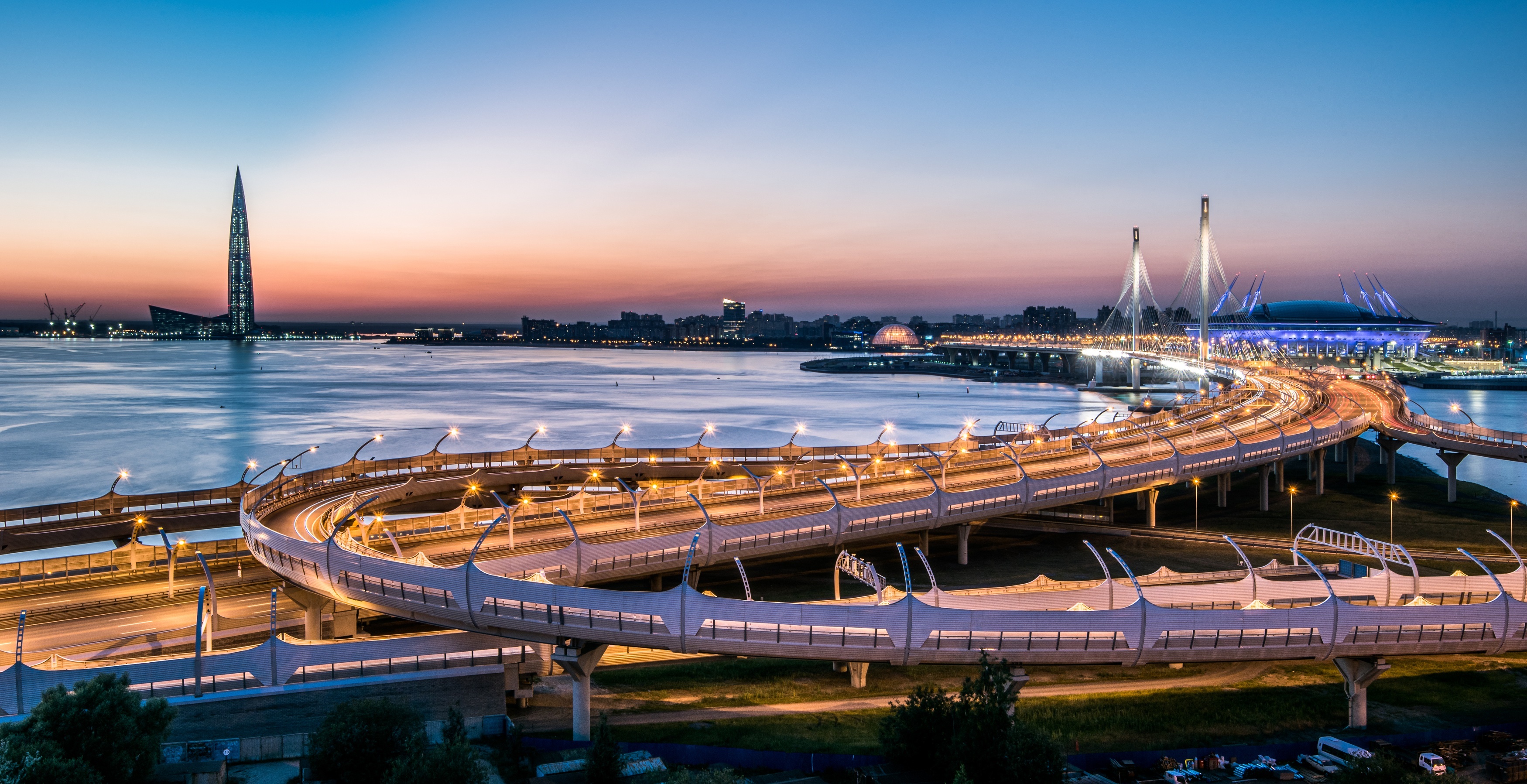 Cable-stayed bridge and Lakhta Center in Saint Petersburg at dusk HD Wallpaper