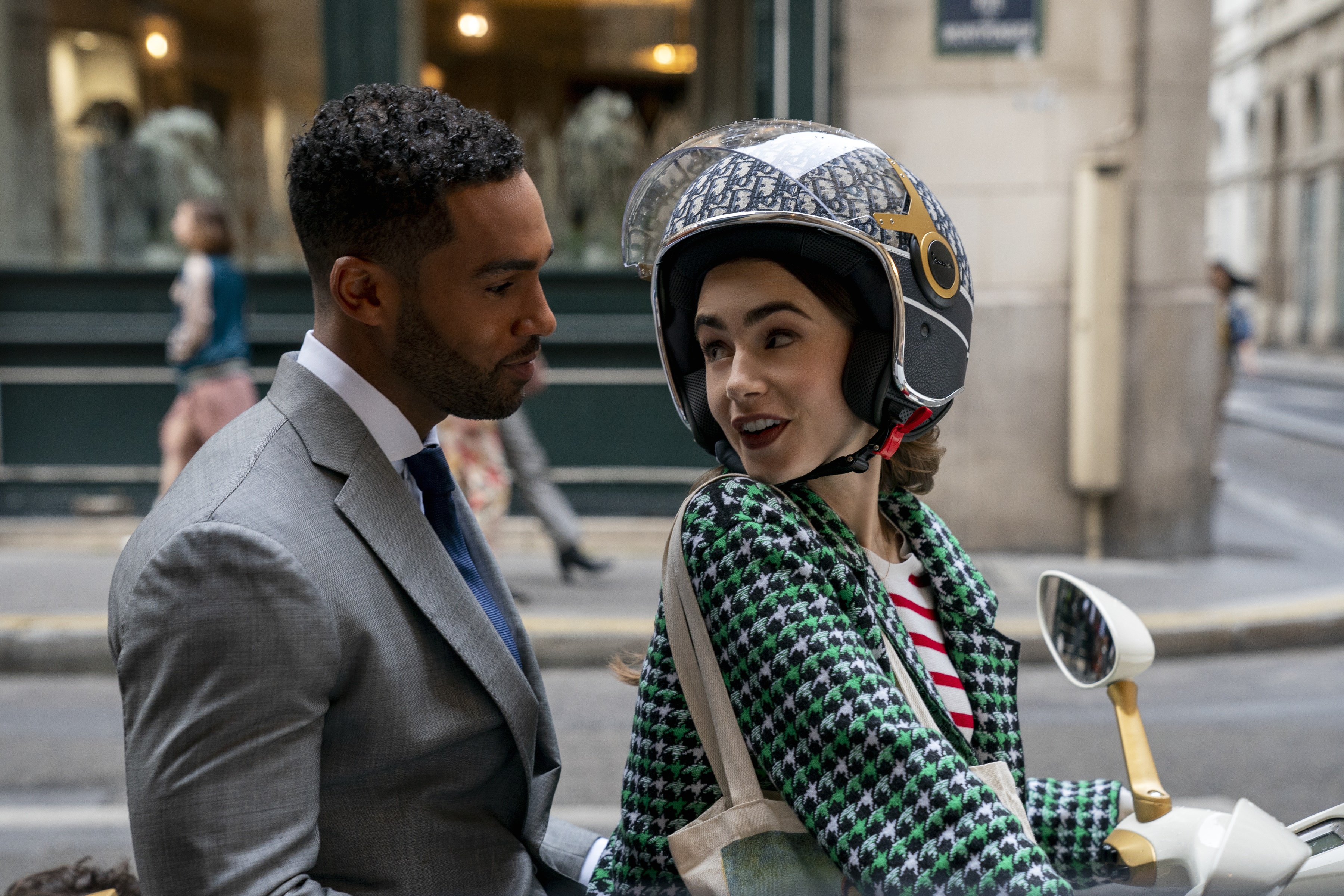 Emily in Paris: Lily Collins and Lucien Laviscount on a scooter HD Wallpaper