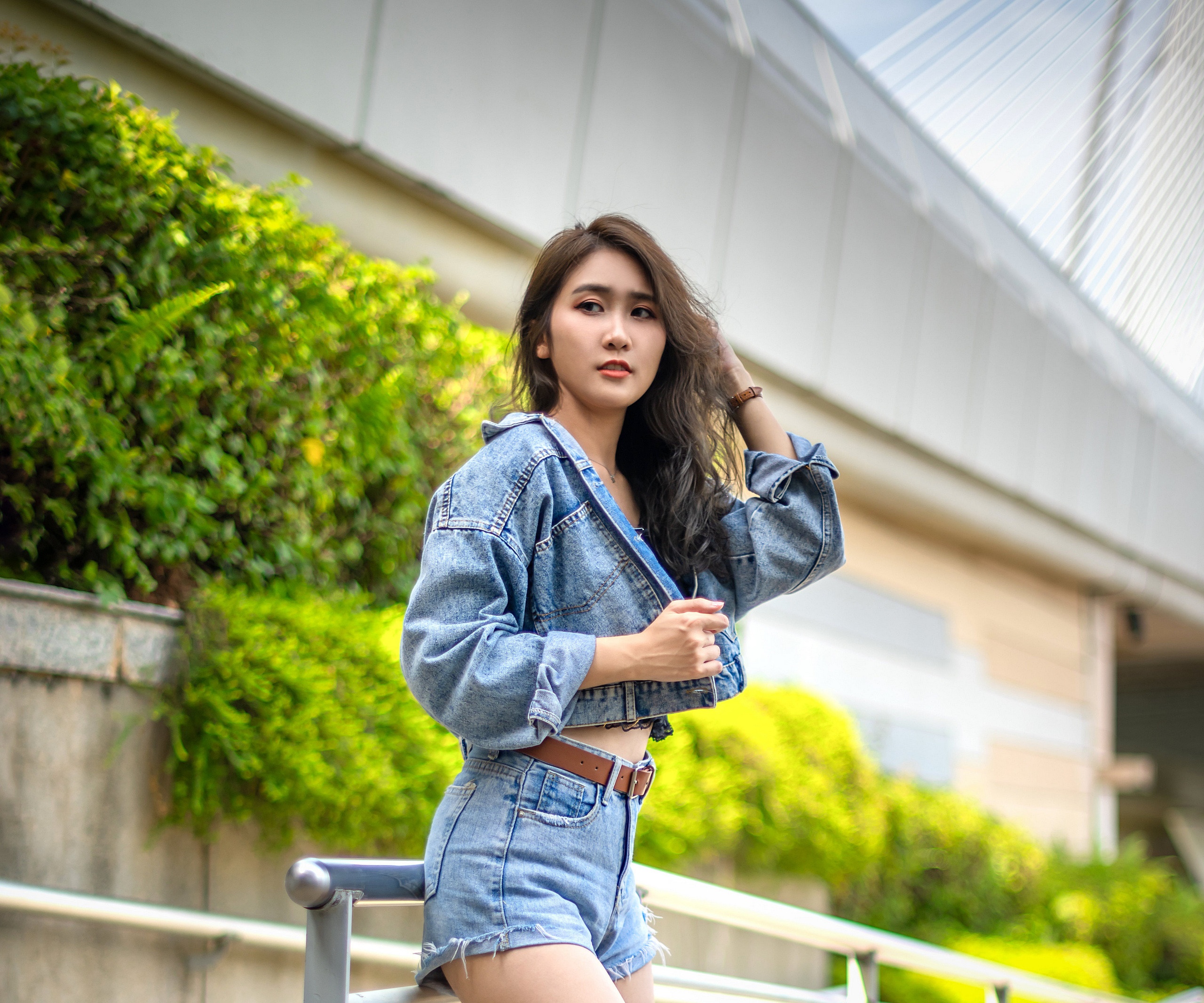 Asian woman in denim shorts and jacket HD Wallpaper