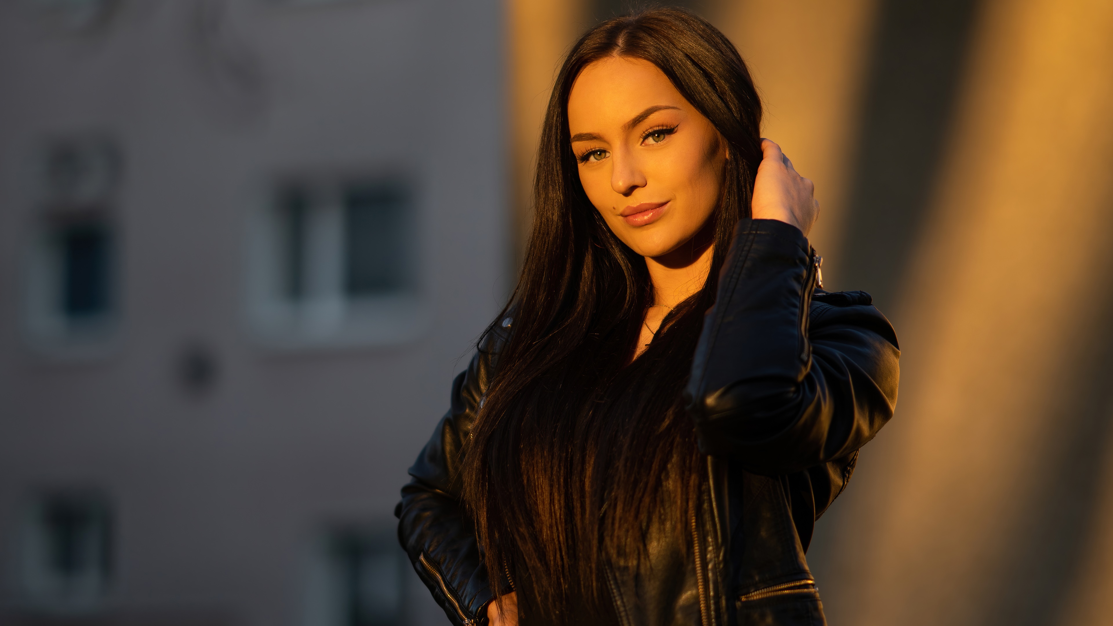 Woman with black hair wearing a leather jacket HD Wallpaper