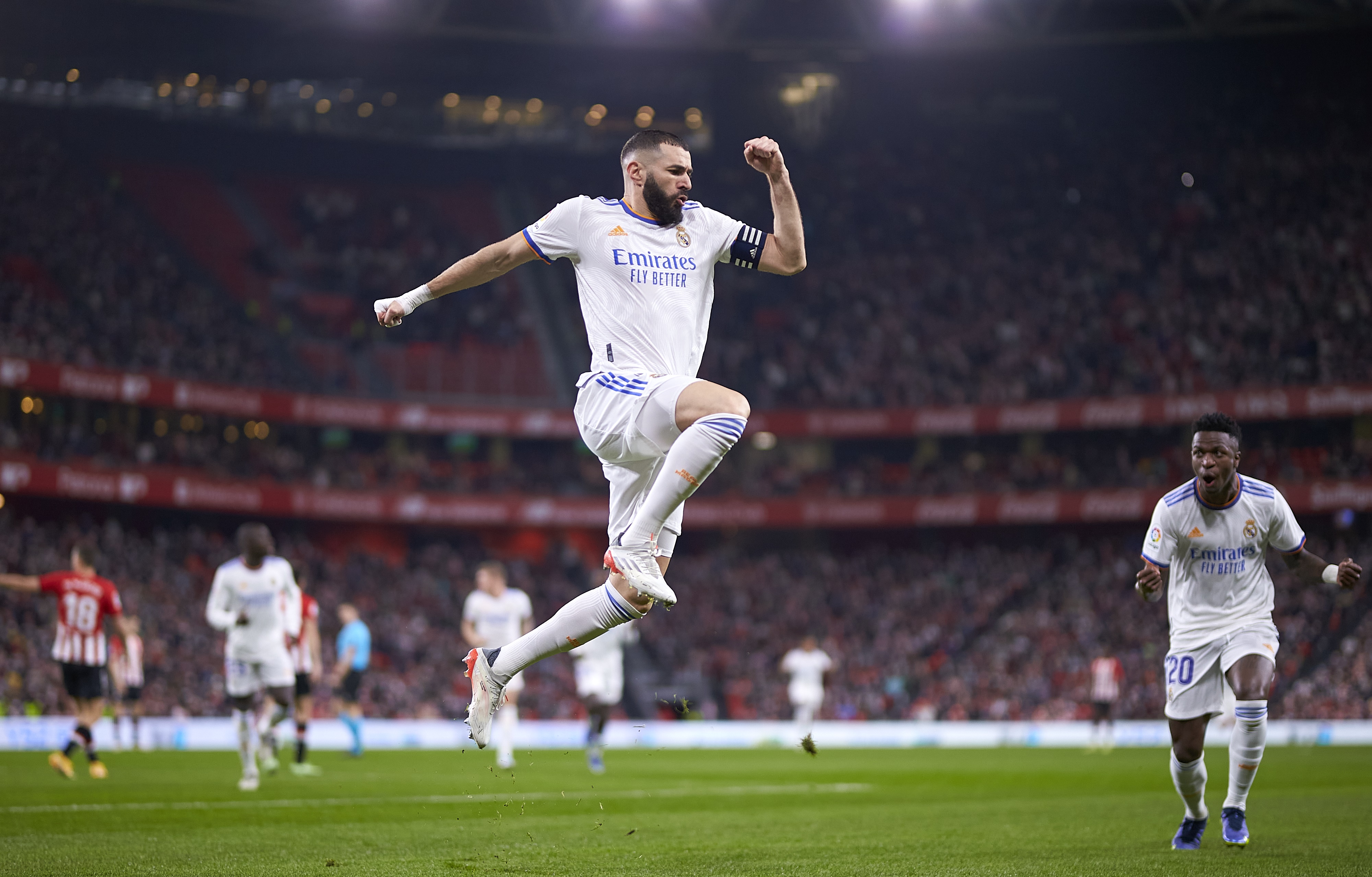 Karim Benzema celebrating a goal in a football match 4K HD Wallpaper
