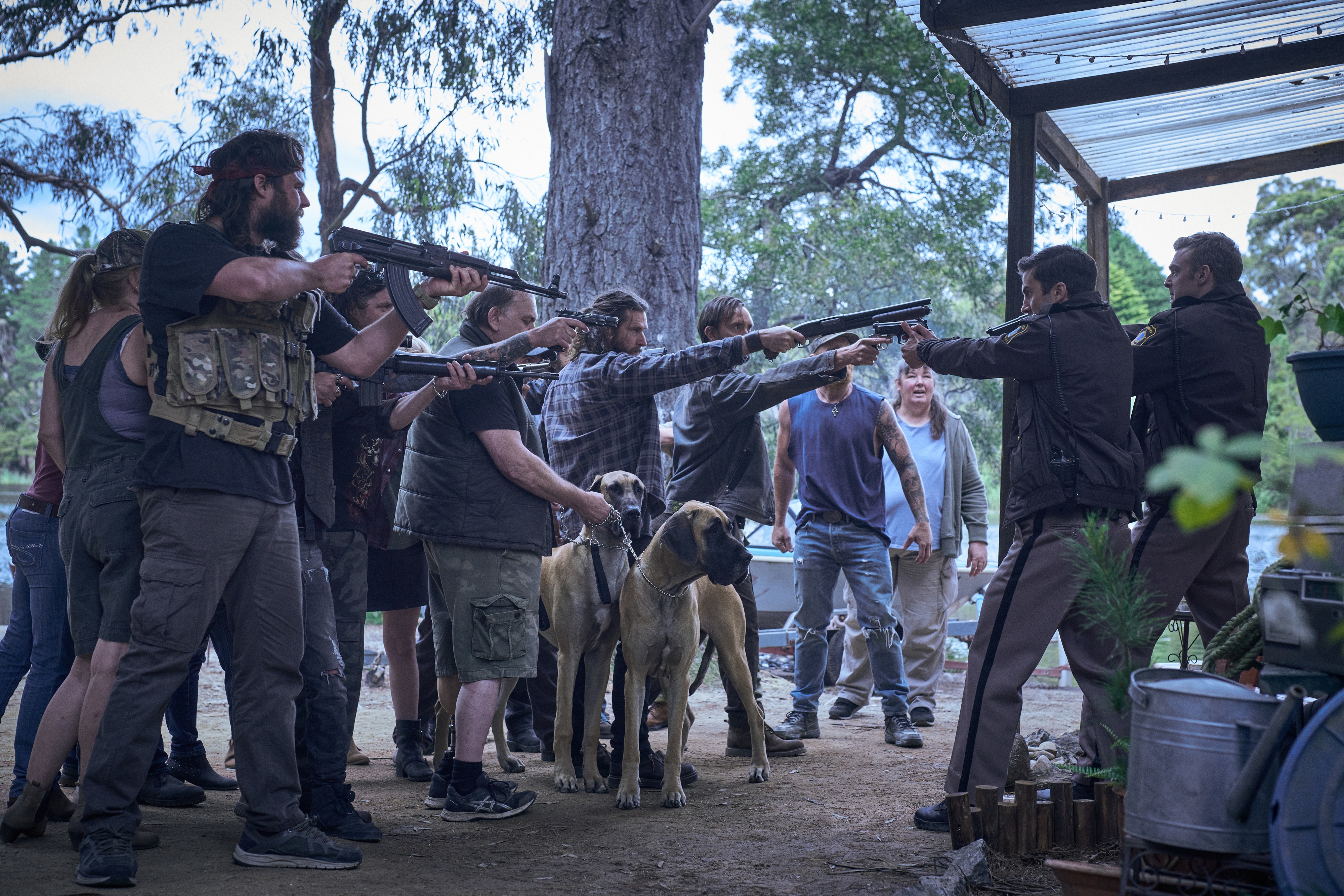 Group of people with guns and dogs HD Wallpaper