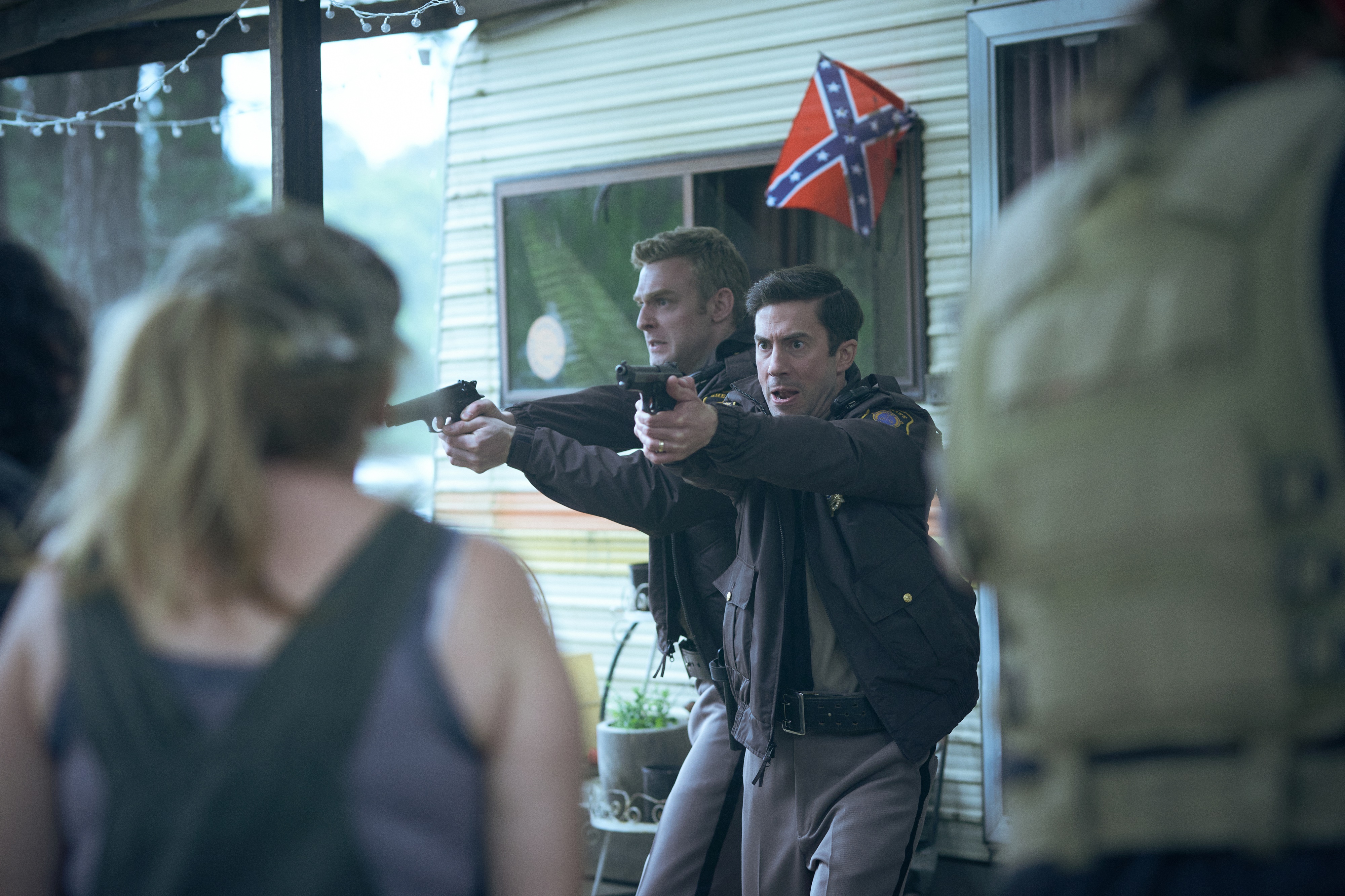Two men in sheriff uniforms aiming guns HD Wallpaper