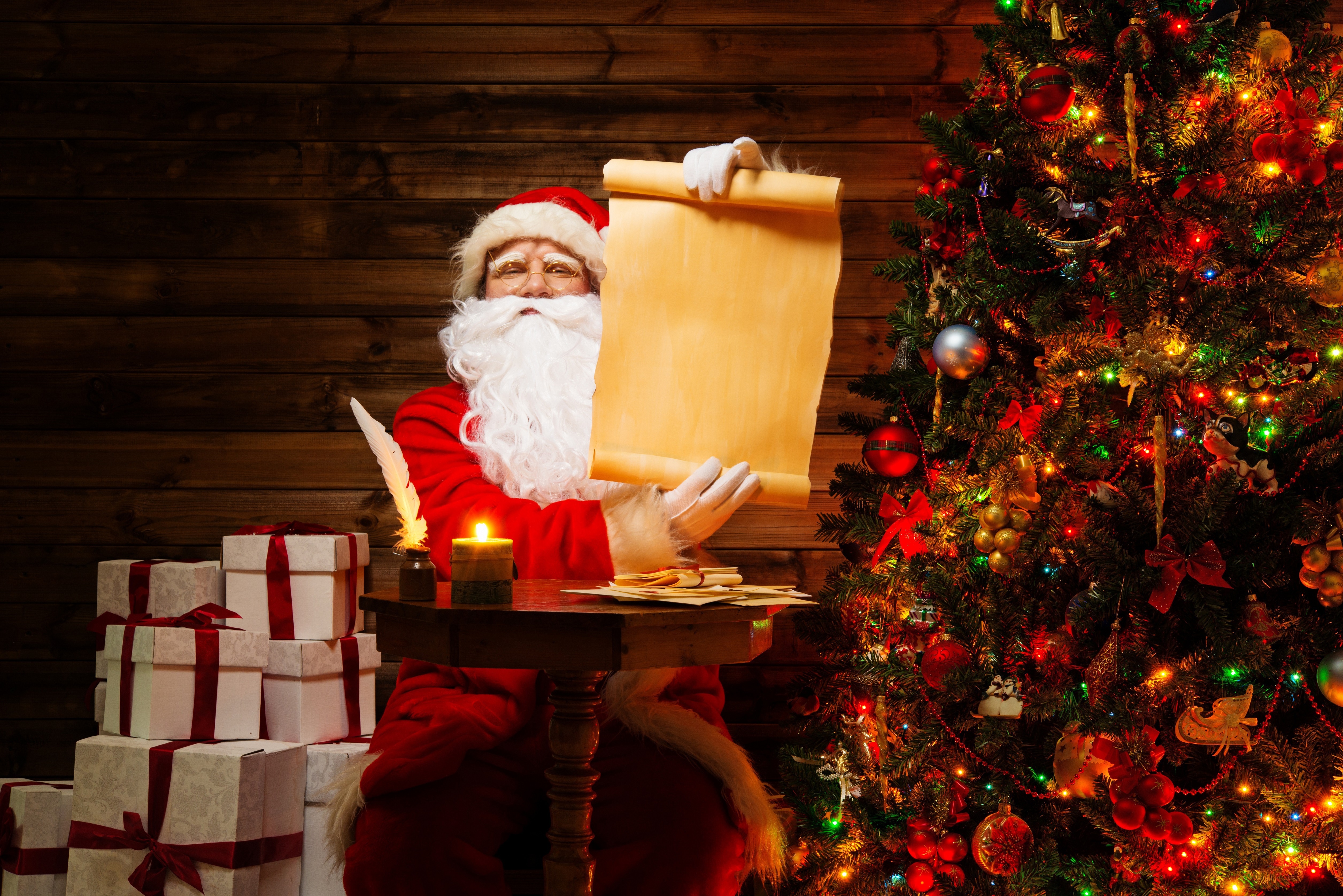 Santa Claus with a scroll and Christmas tree HD Wallpaper