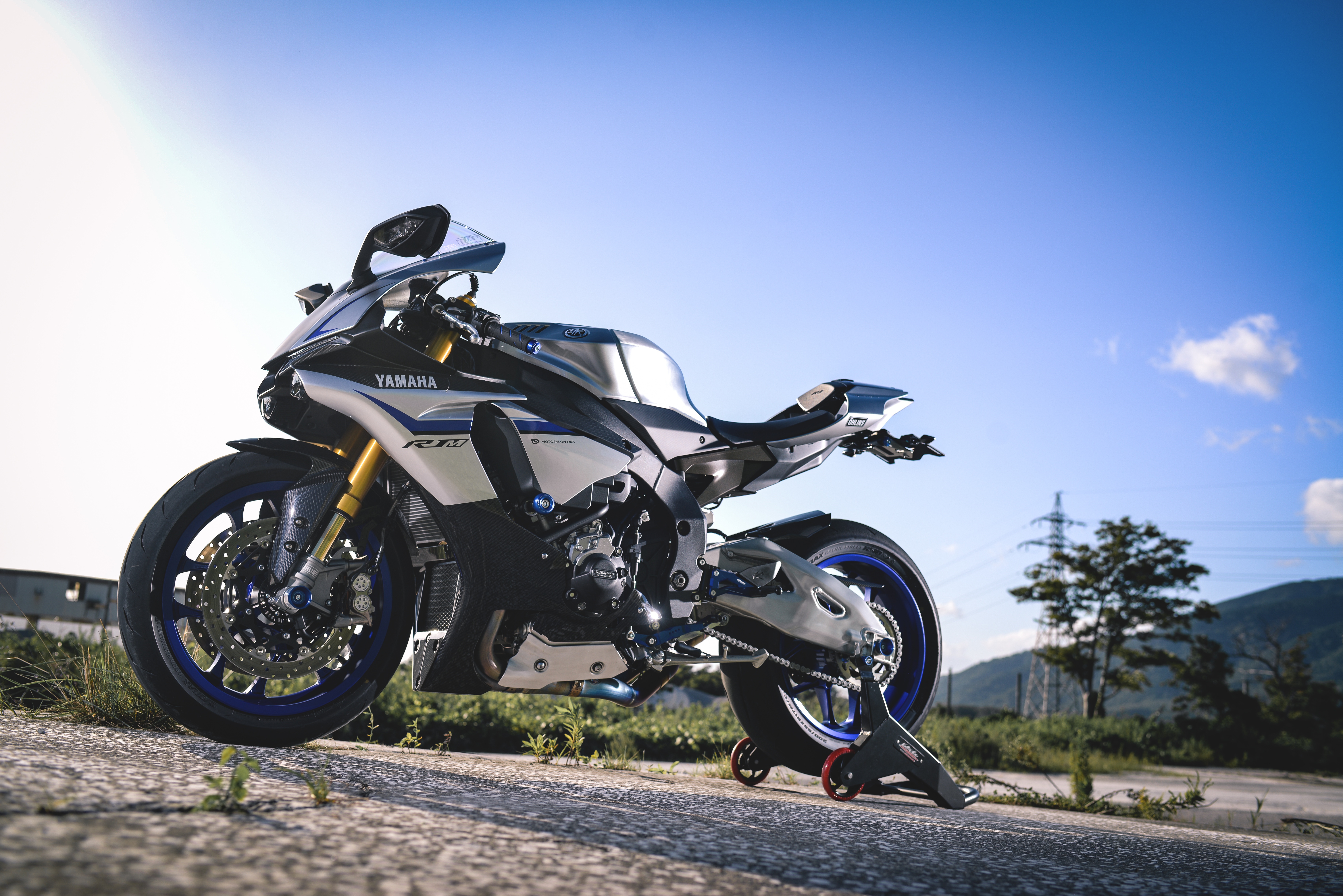 Yamaha YZF-R1 motorcycle on a stand HD Wallpaper