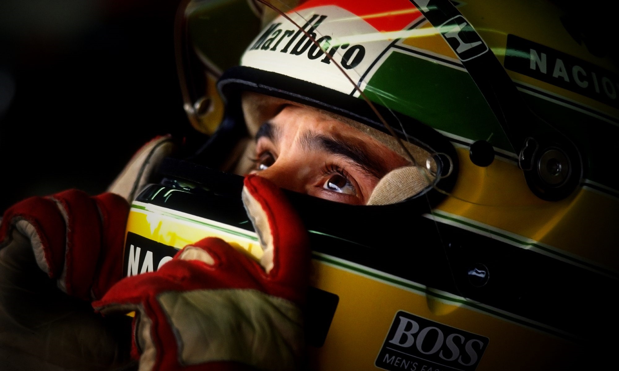 Ayrton Senna in a racing helmet HD Wallpaper