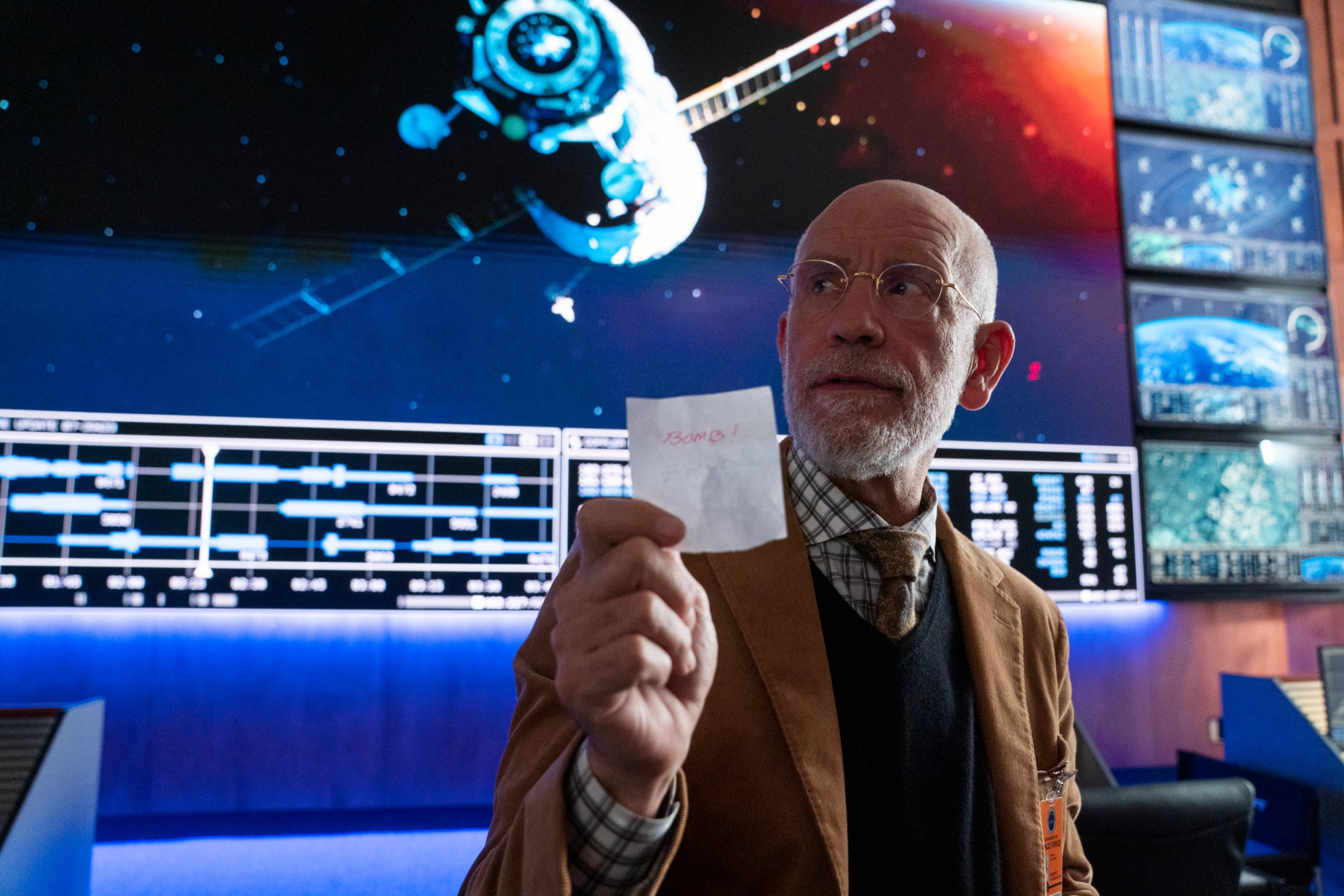 Adrian Mallory from Space Force holding a note HD Wallpaper